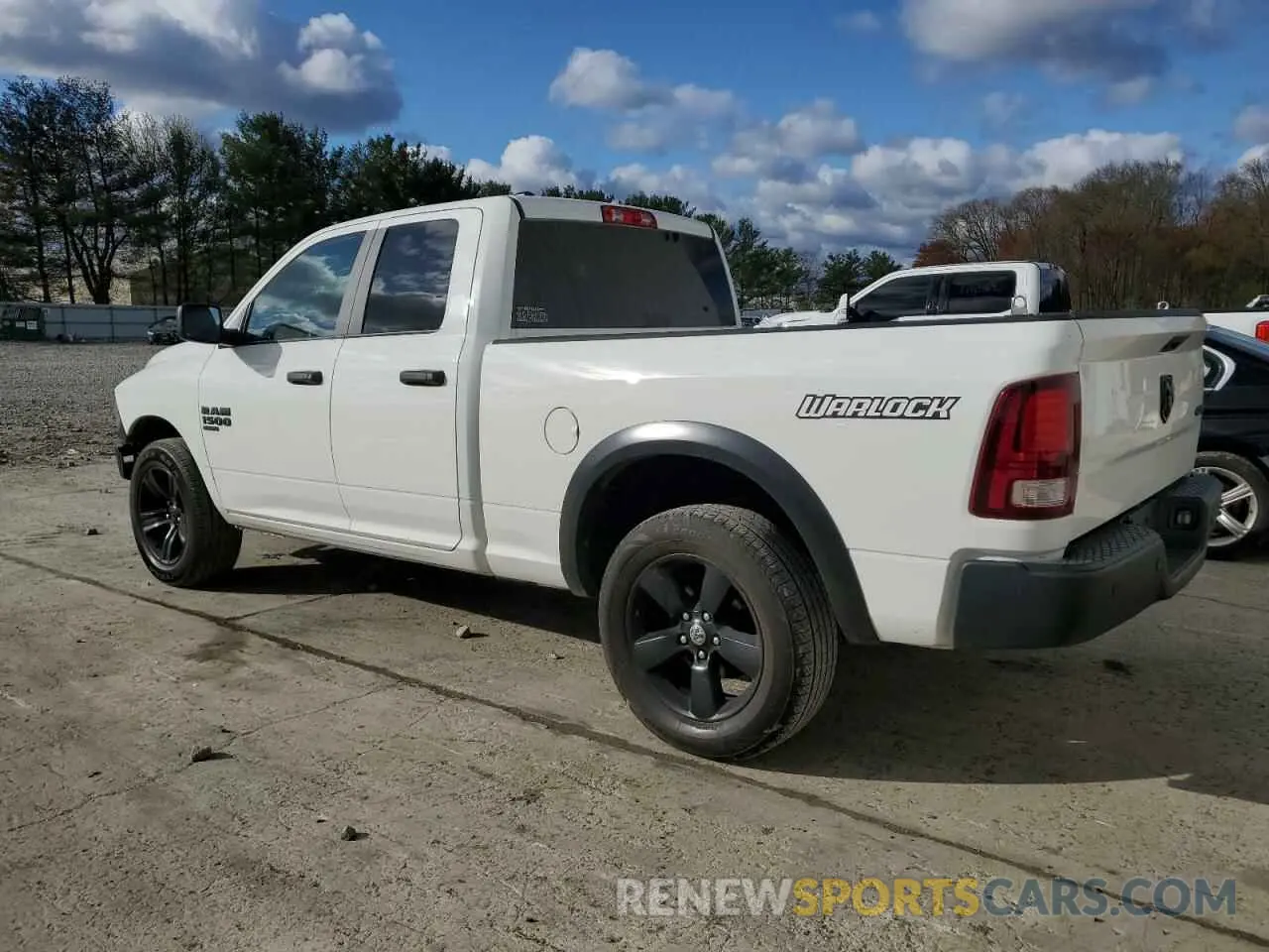 2 Photograph of a damaged car 1C6RR7GG2MS502020 RAM 1500 2021