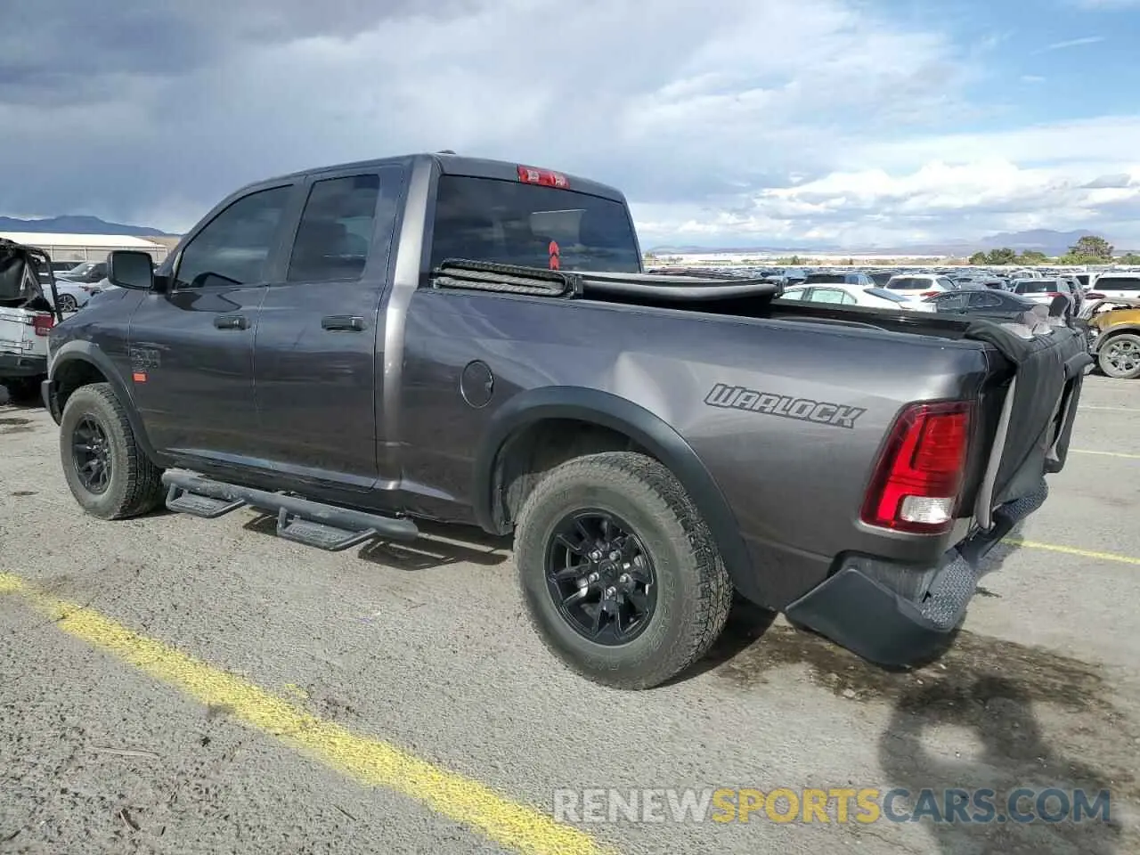 2 Photograph of a damaged car 1C6RR7GG2MS557079 RAM 1500 2021