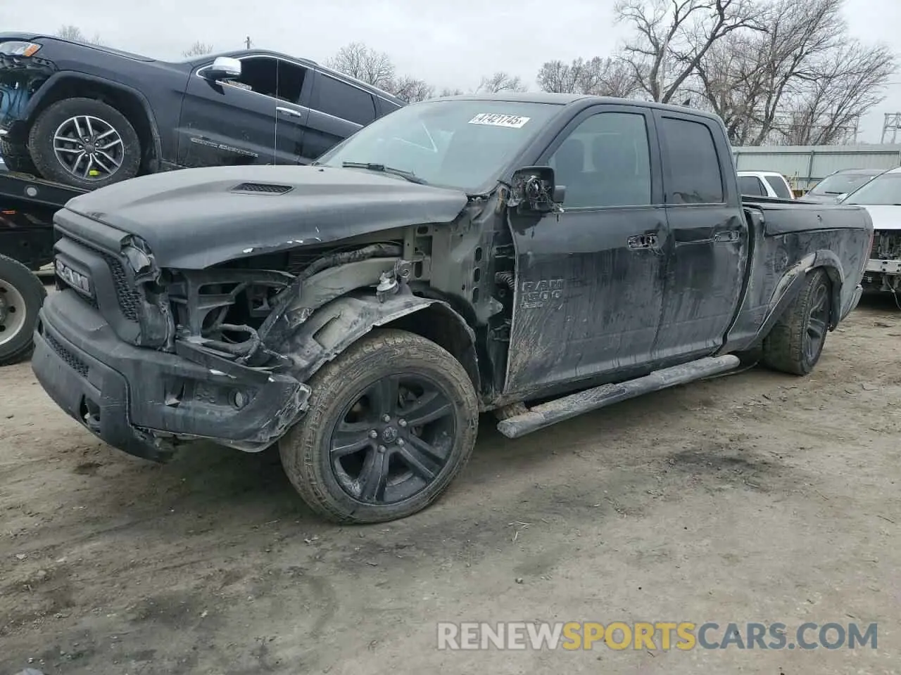 1 Photograph of a damaged car 1C6RR7GGXMS531233 RAM 1500 2021
