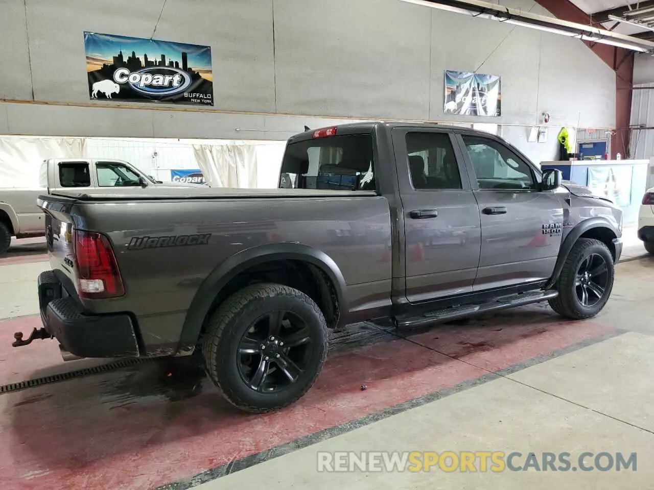 3 Photograph of a damaged car 1C6RR7GT2MS502631 RAM 1500 2021