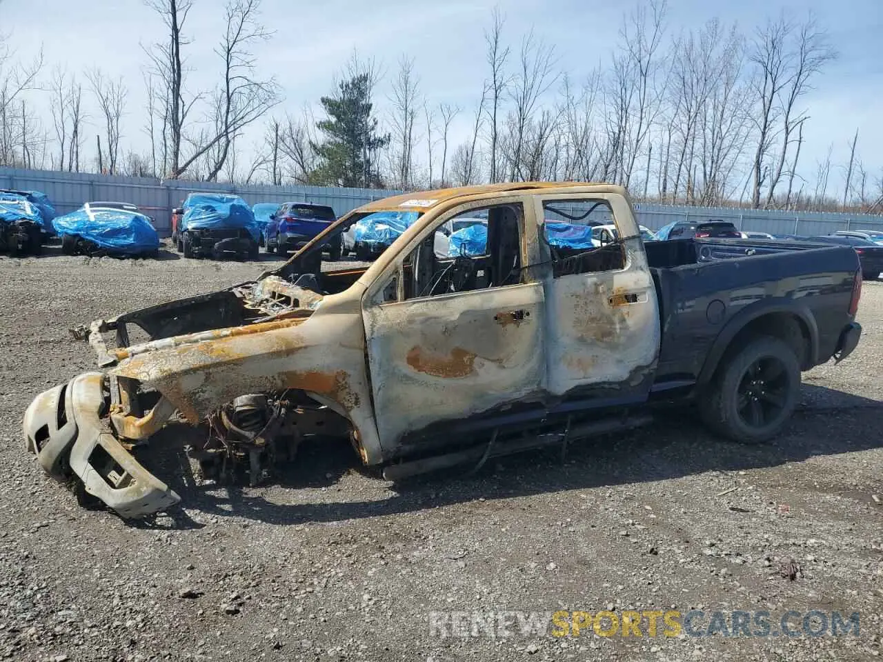 1 Photograph of a damaged car 1C6RR7GT4MS582112 RAM 1500 2021