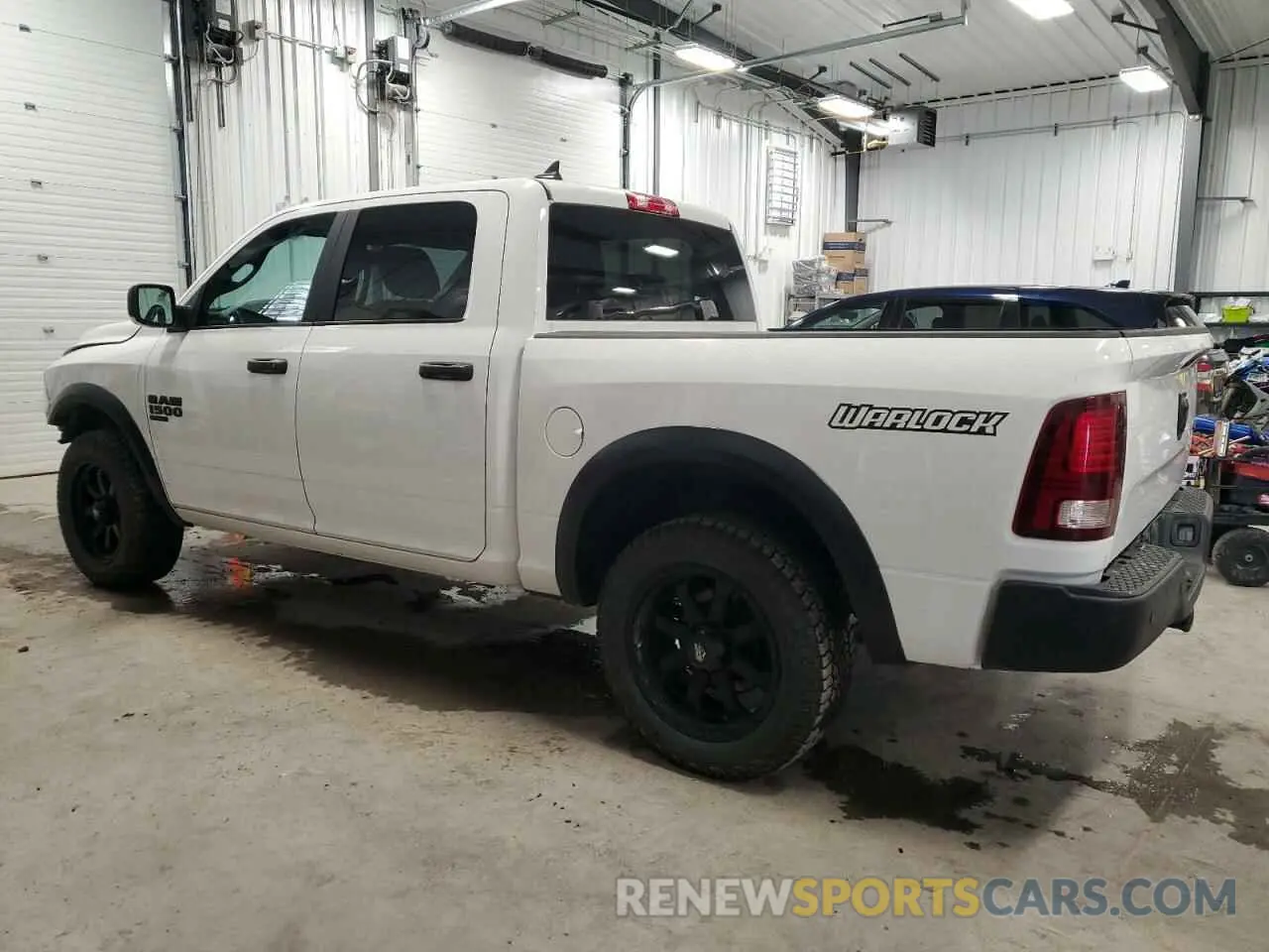 2 Photograph of a damaged car 1C6RR7LG5MS589126 RAM 1500 2021