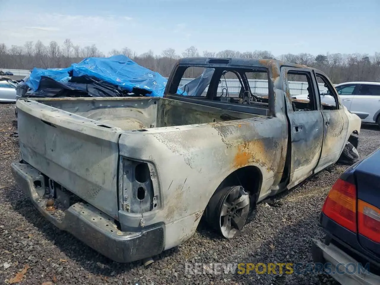 3 Photograph of a damaged car 1C6RR7LG7MS542728 RAM 1500 2021