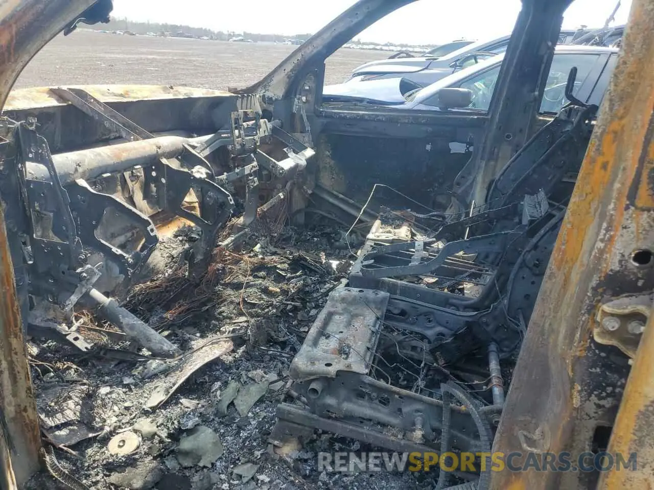 7 Photograph of a damaged car 1C6RR7LG7MS542728 RAM 1500 2021