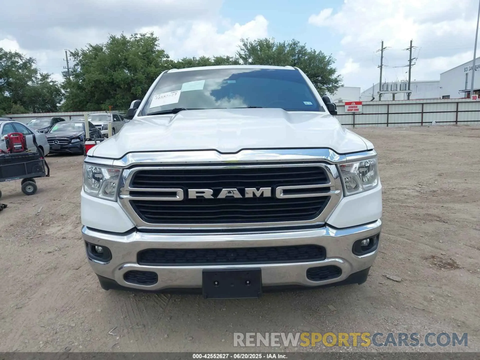 13 Photograph of a damaged car 1C6RREBG0MN752690 RAM 1500 2021