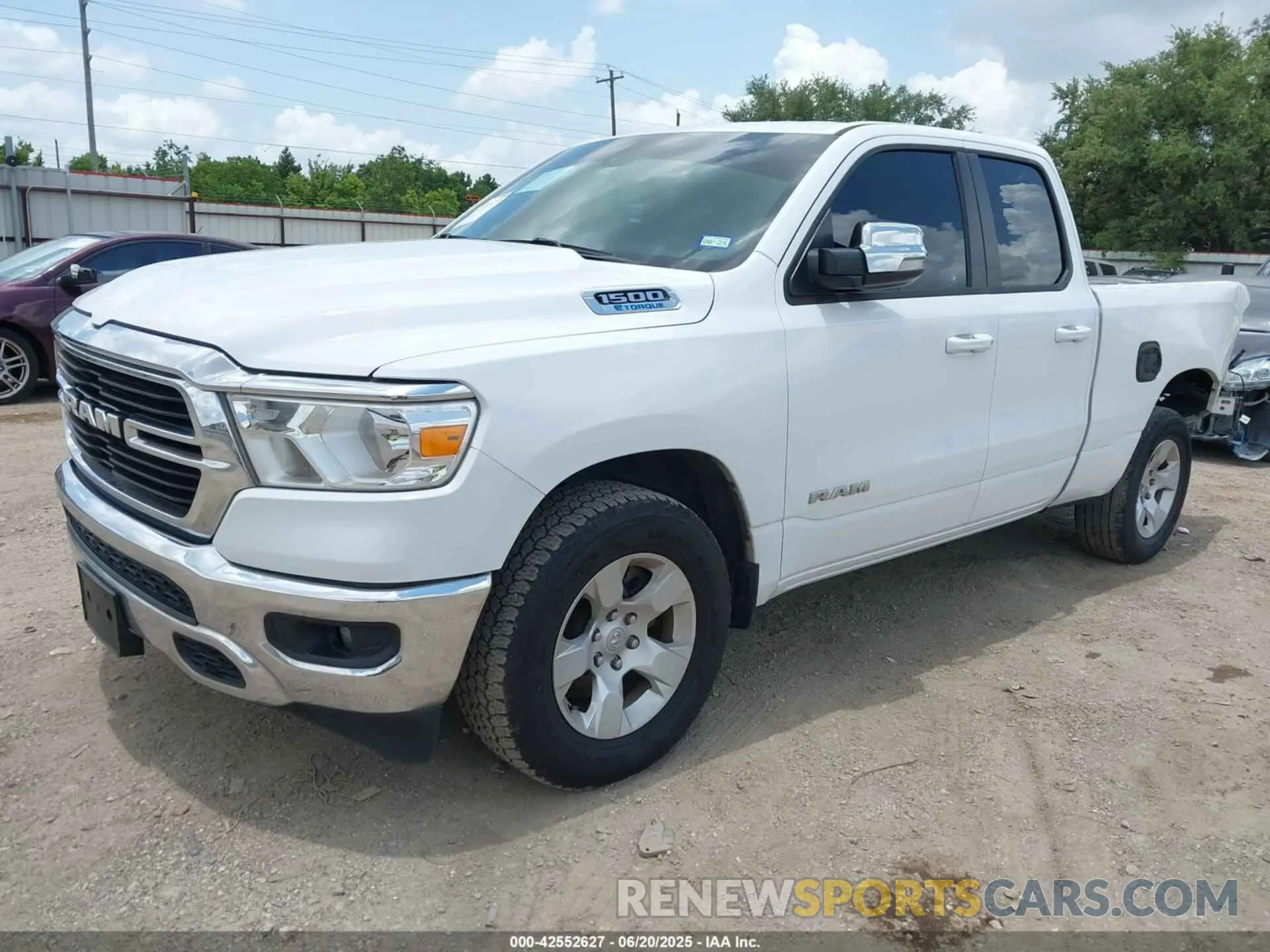 2 Photograph of a damaged car 1C6RREBG0MN752690 RAM 1500 2021
