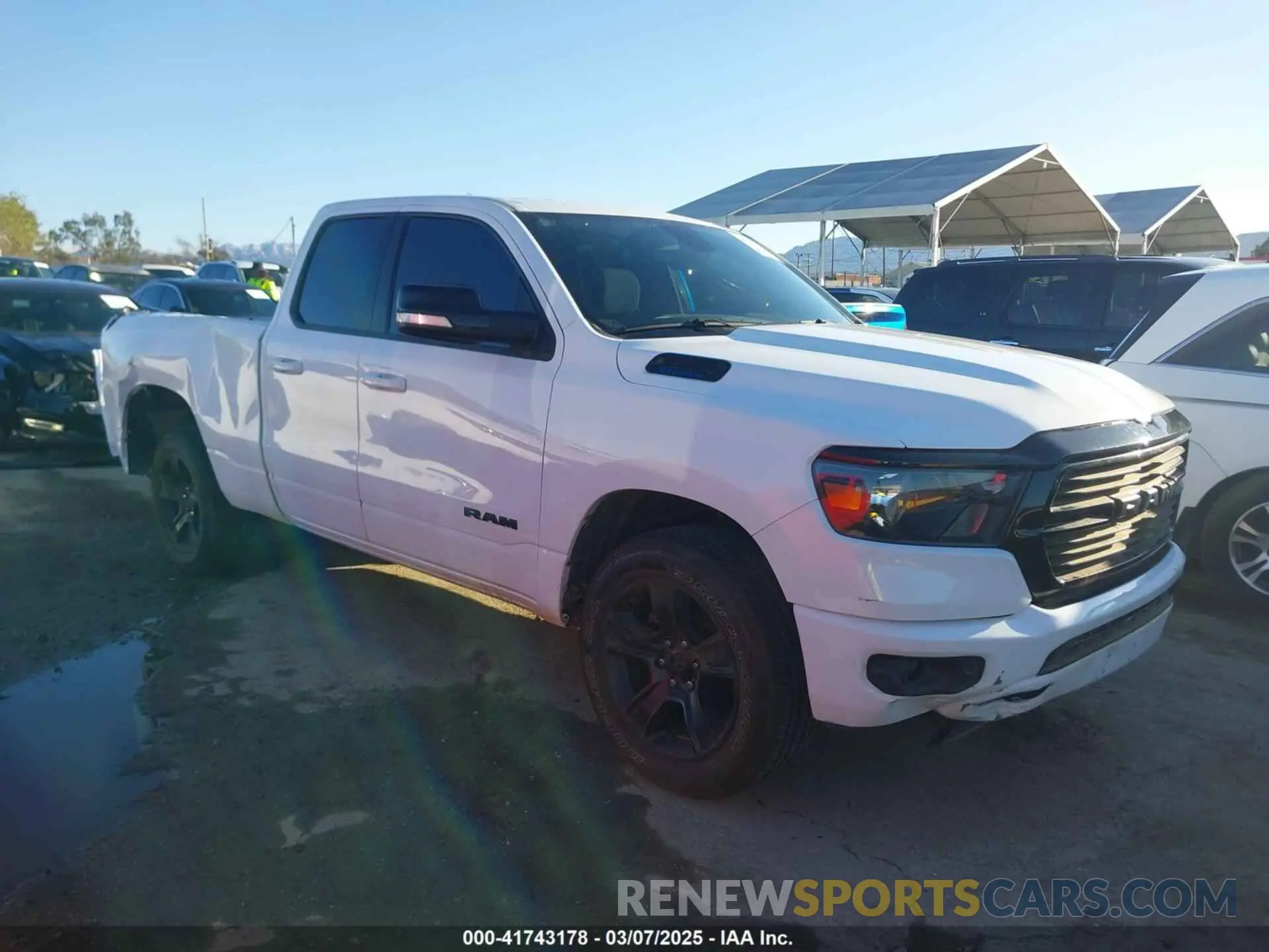 1 Photograph of a damaged car 1C6RREBG3MN712541 RAM 1500 2021
