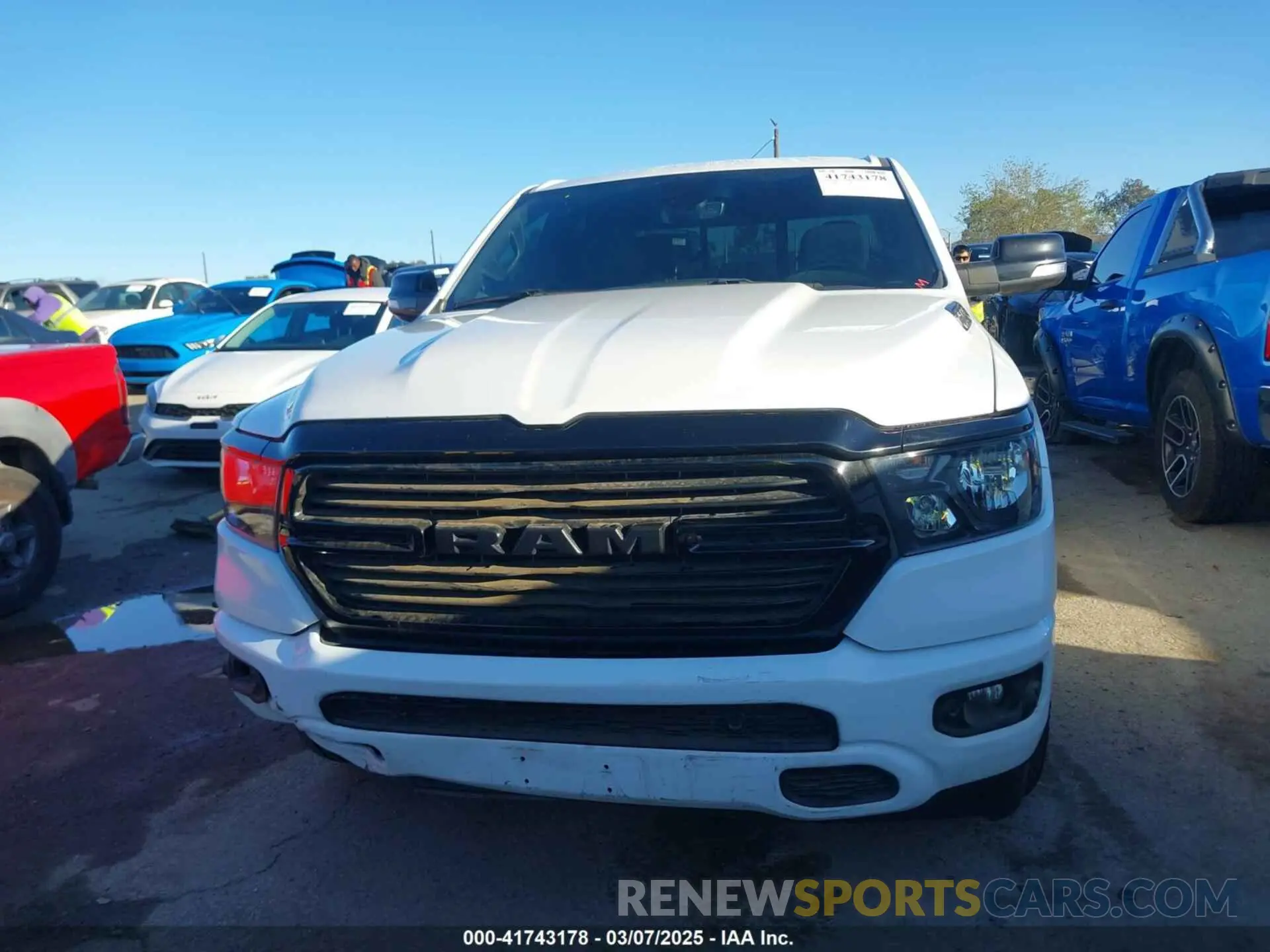 13 Photograph of a damaged car 1C6RREBG3MN712541 RAM 1500 2021