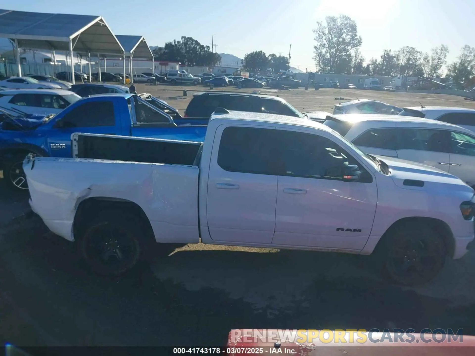 14 Photograph of a damaged car 1C6RREBG3MN712541 RAM 1500 2021