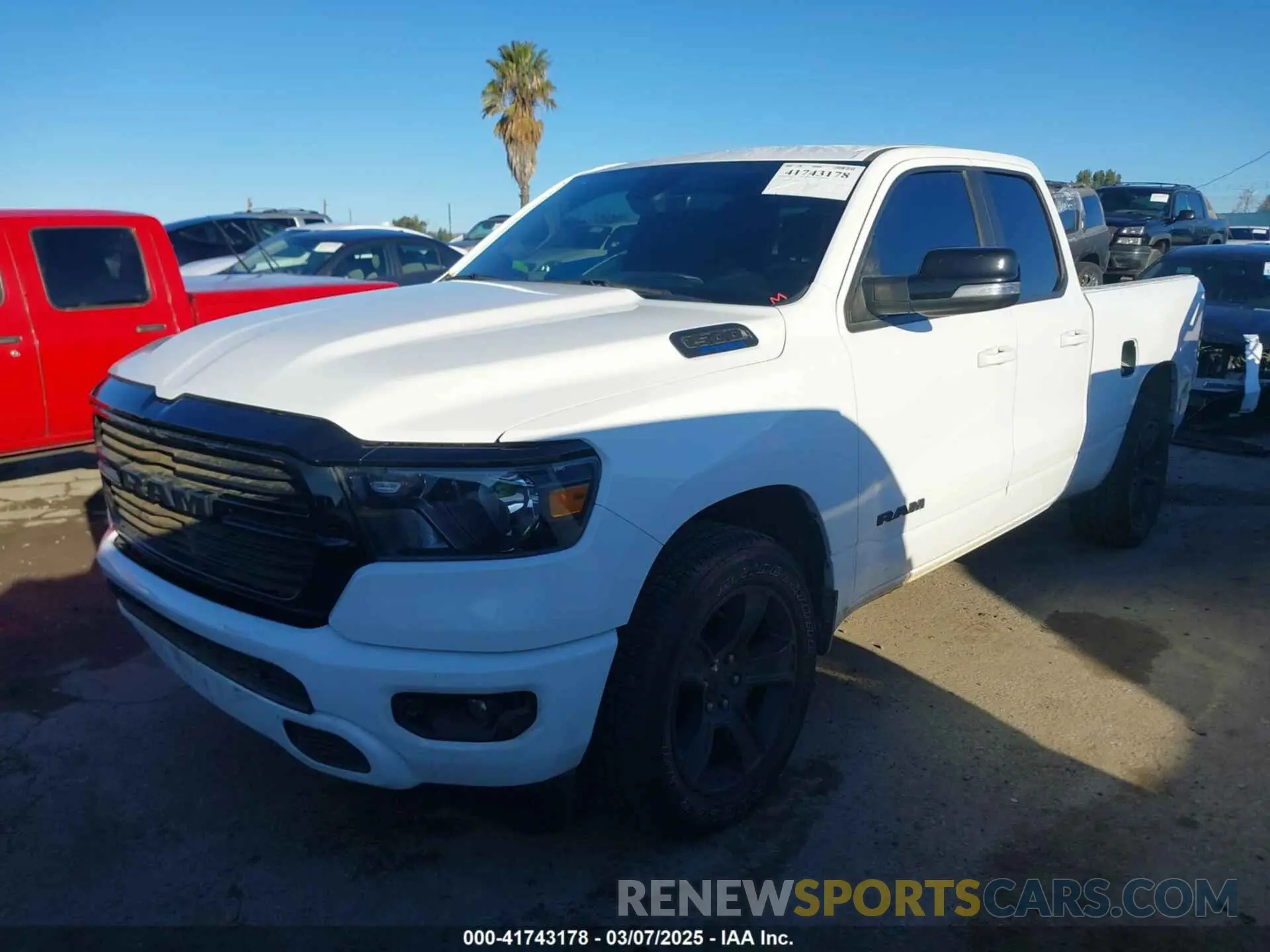 2 Photograph of a damaged car 1C6RREBG3MN712541 RAM 1500 2021