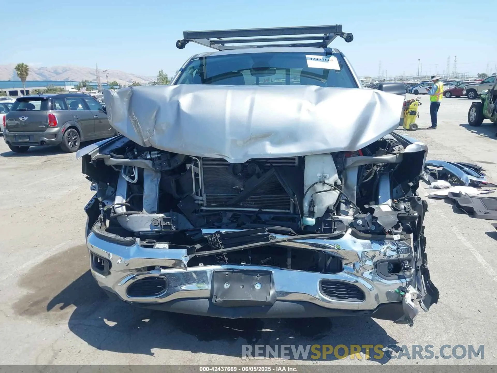12 Photograph of a damaged car 1C6RREBG9MN681473 RAM 1500 2021