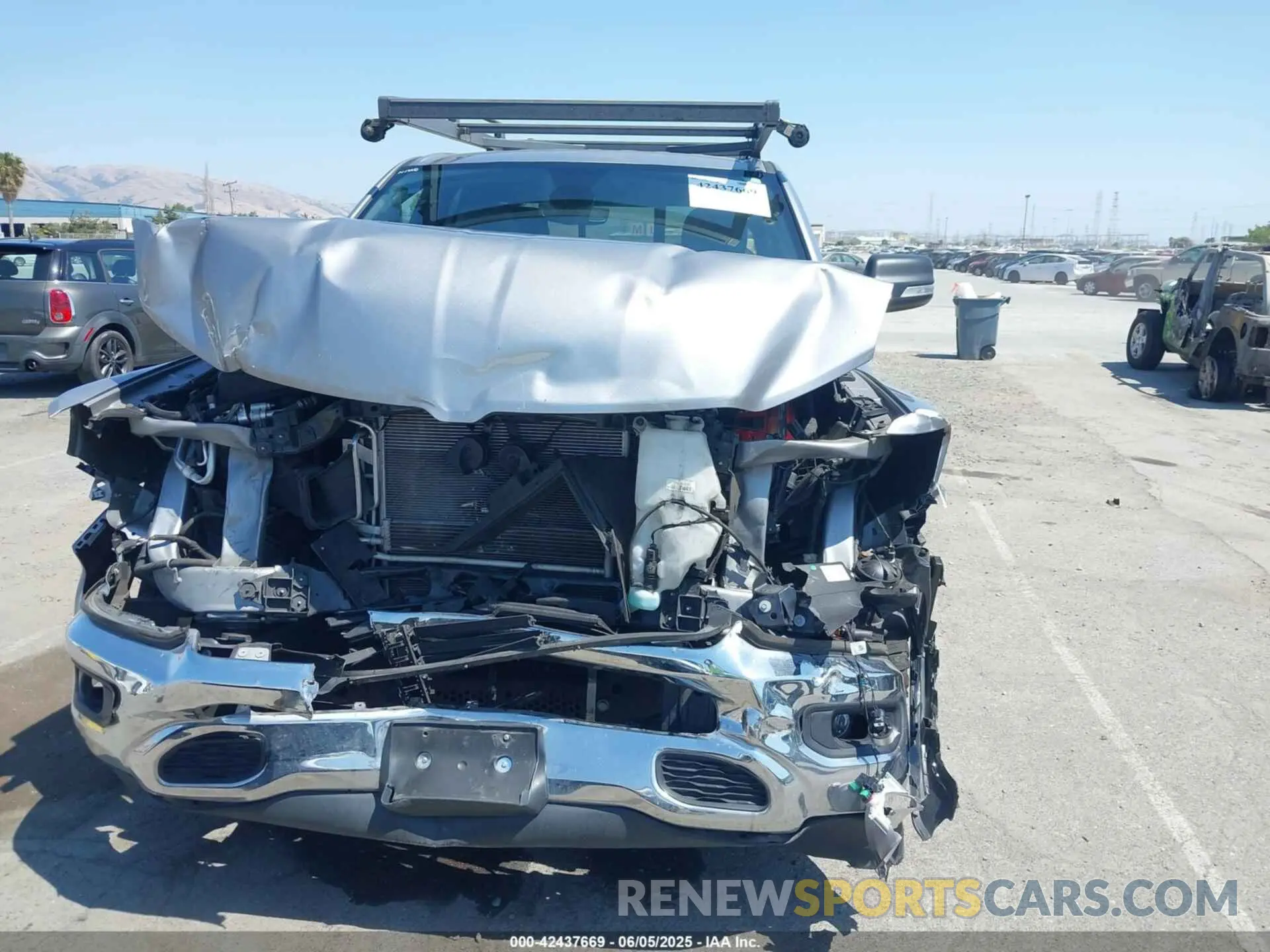 6 Photograph of a damaged car 1C6RREBG9MN681473 RAM 1500 2021