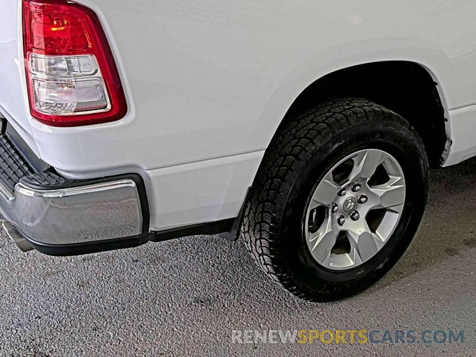 12 Photograph of a damaged car 1C6RREBT0MN533287 RAM 1500 2021