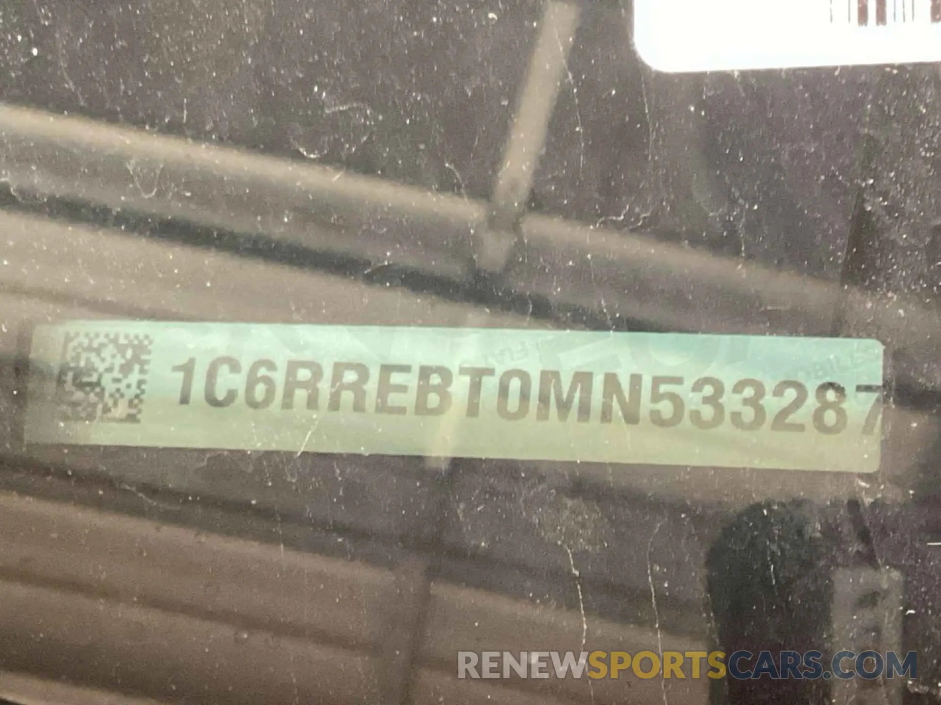 14 Photograph of a damaged car 1C6RREBT0MN533287 RAM 1500 2021