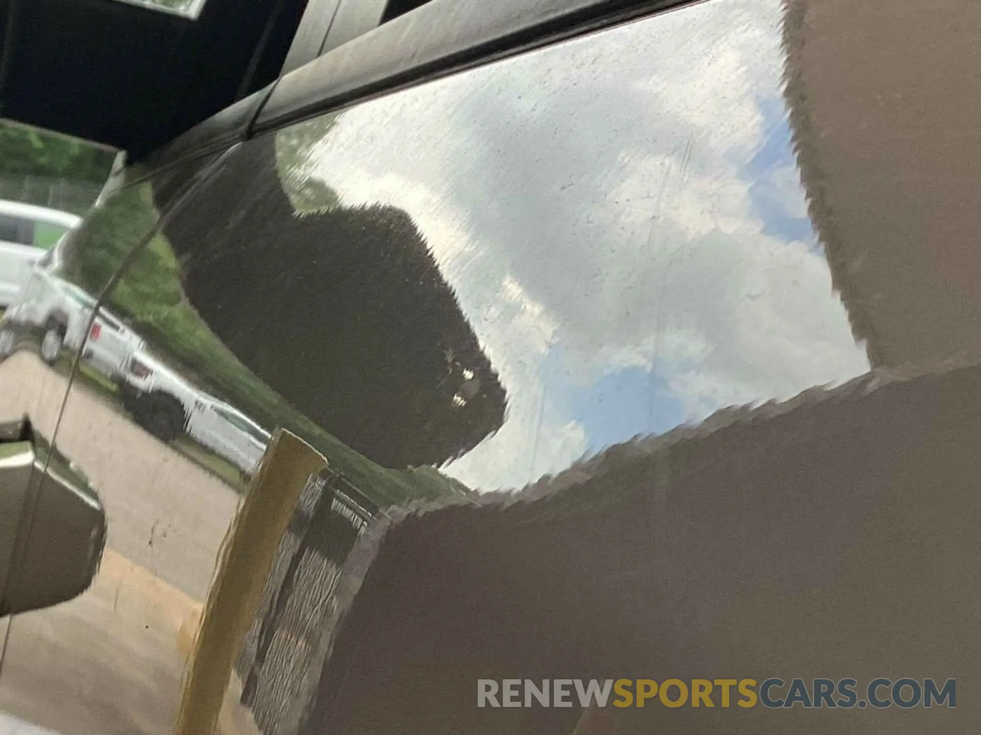 21 Photograph of a damaged car 1C6RREBT0MN533287 RAM 1500 2021
