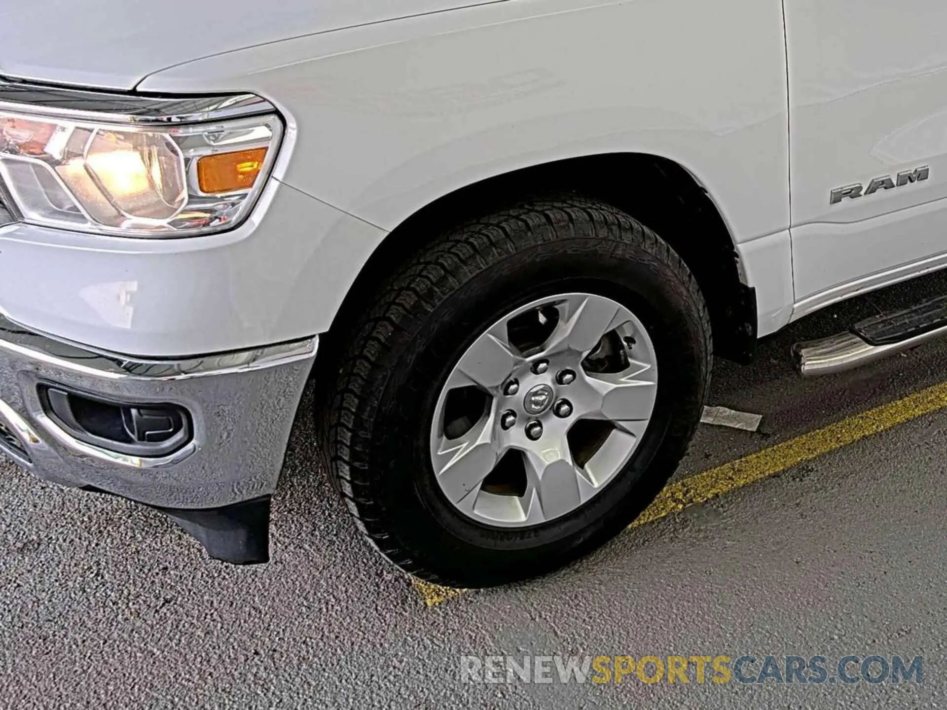 31 Photograph of a damaged car 1C6RREBT0MN533287 RAM 1500 2021
