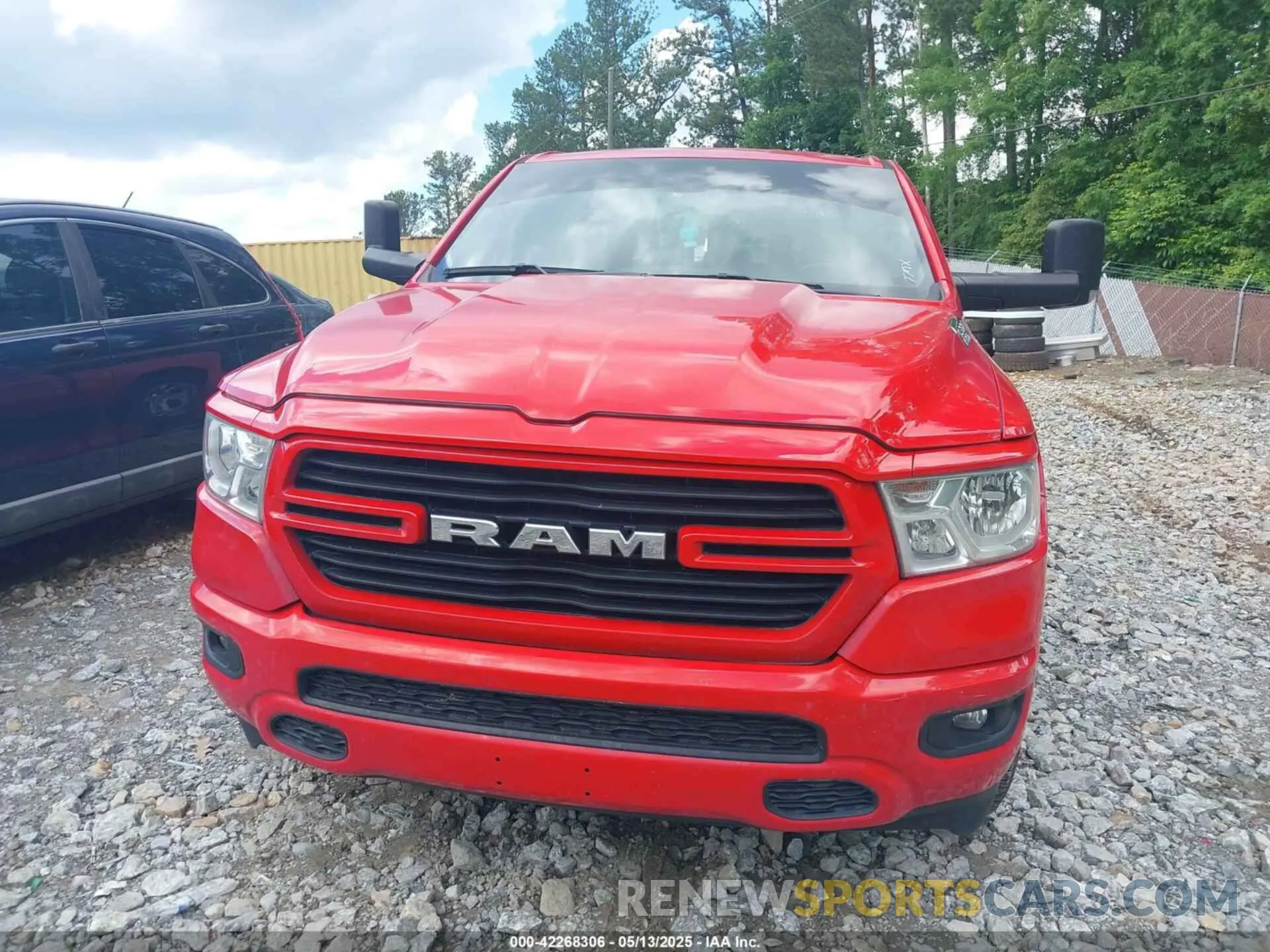 12 Photograph of a damaged car 1C6RREBT0MN828129 RAM 1500 2021