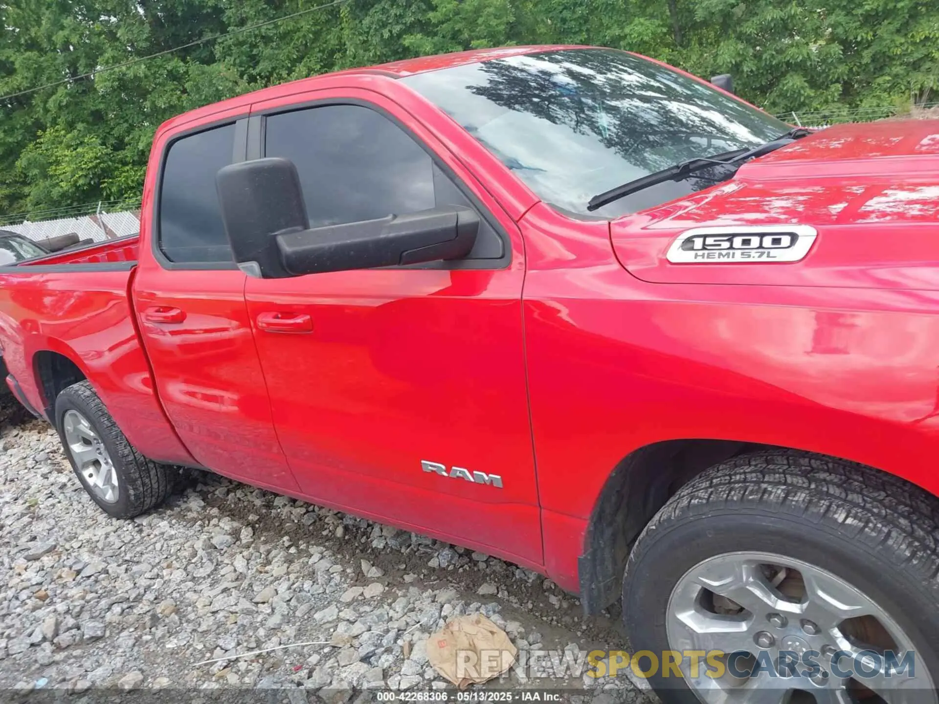 13 Photograph of a damaged car 1C6RREBT0MN828129 RAM 1500 2021
