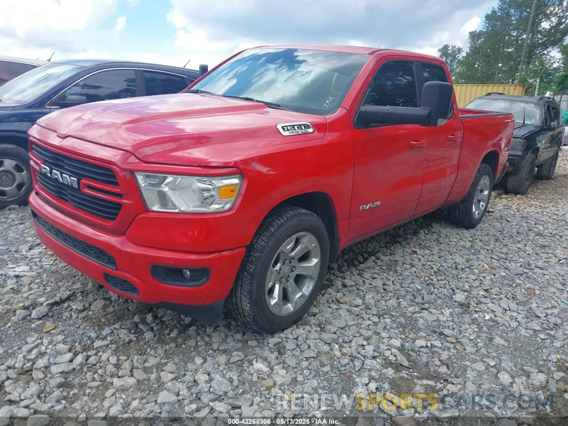 2 Photograph of a damaged car 1C6RREBT0MN828129 RAM 1500 2021