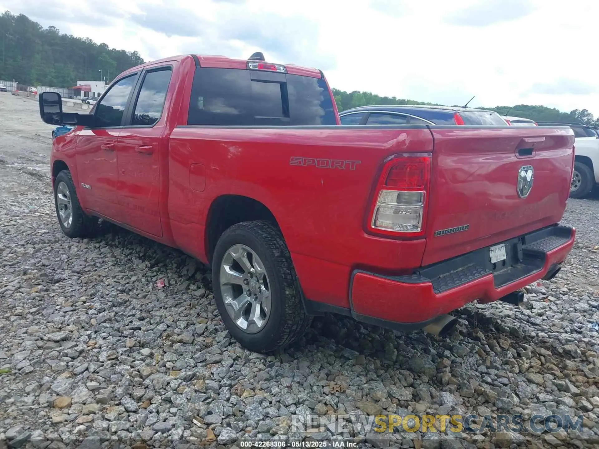 3 Photograph of a damaged car 1C6RREBT0MN828129 RAM 1500 2021