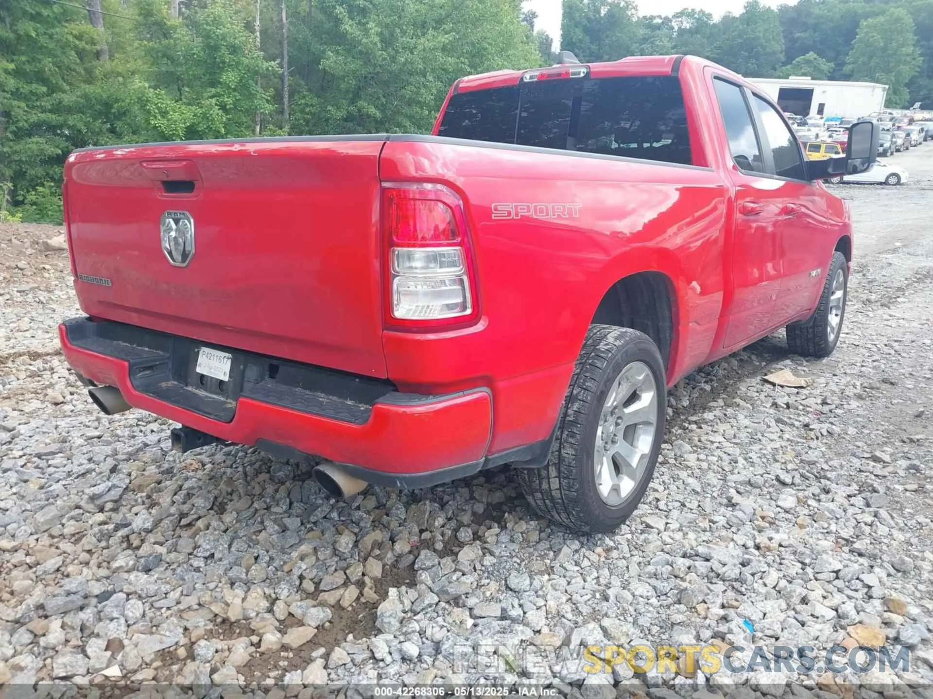 4 Photograph of a damaged car 1C6RREBT0MN828129 RAM 1500 2021