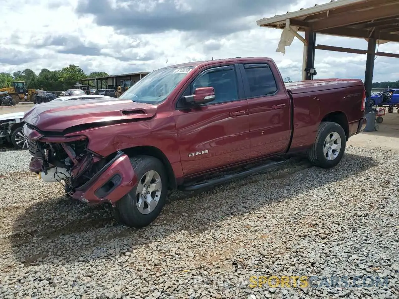 1 Photograph of a damaged car 1C6RREBT2MN712365 RAM 1500 2021