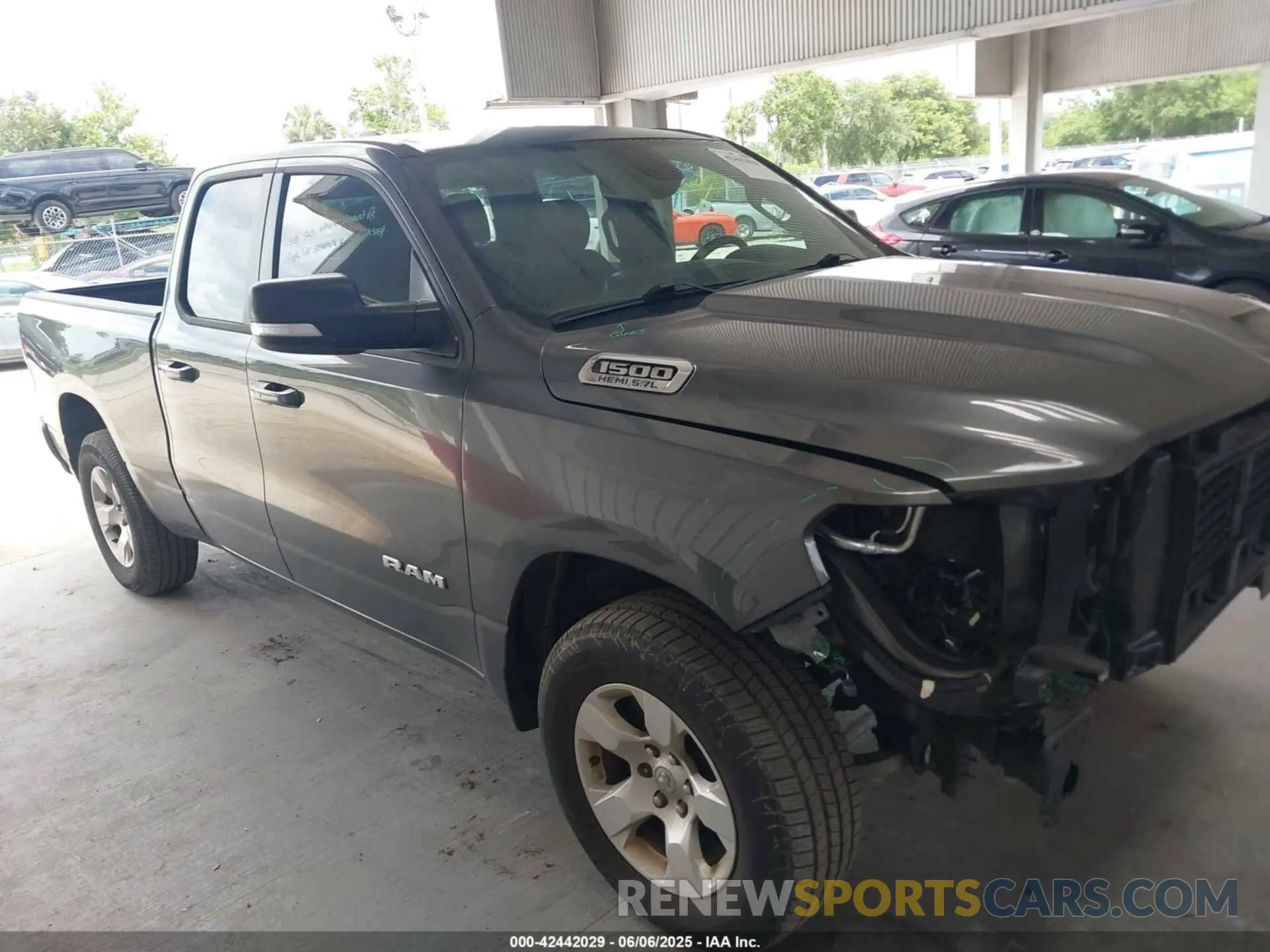 1 Photograph of a damaged car 1C6RREBT2MN747391 RAM 1500 2021