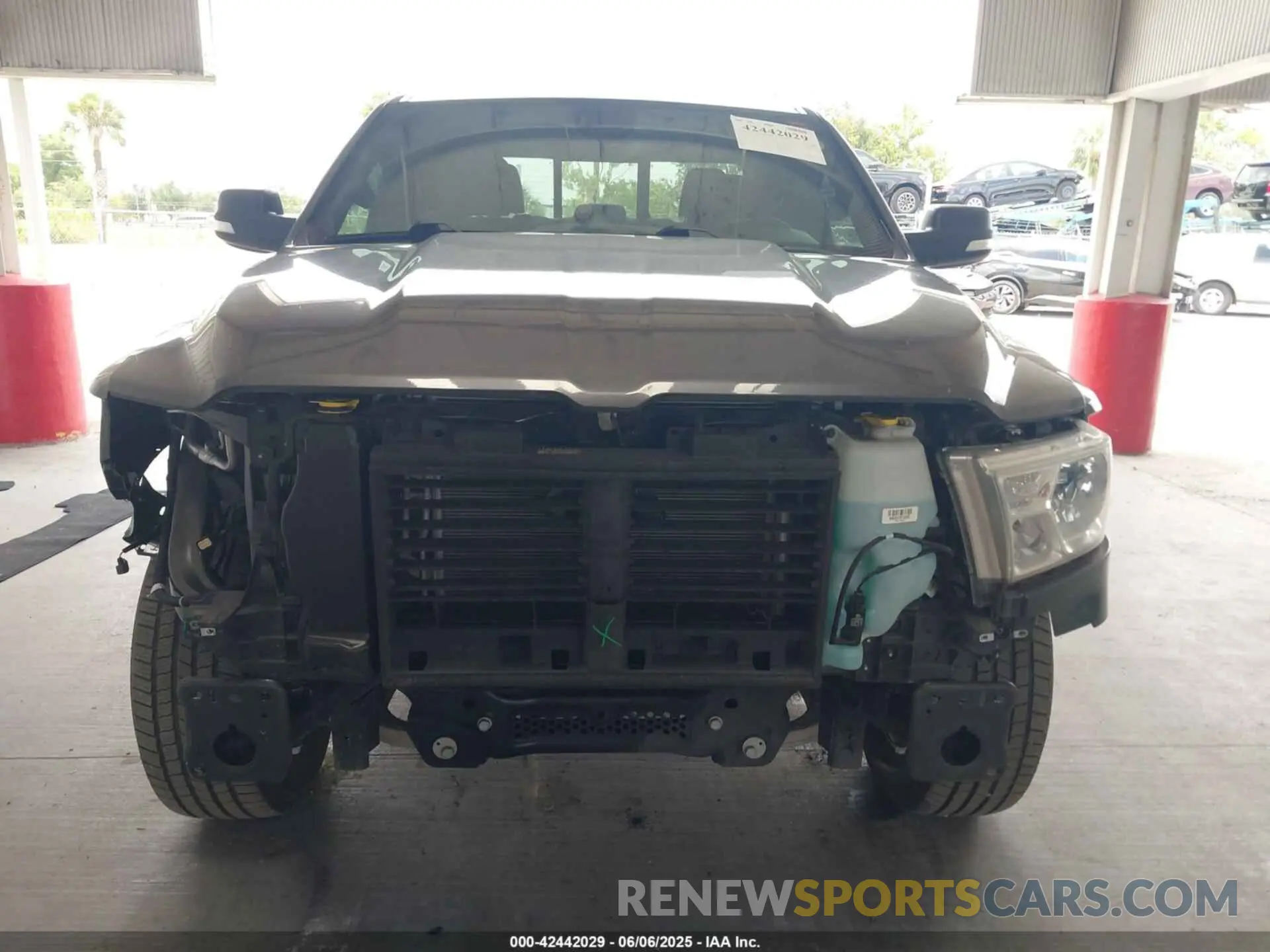 13 Photograph of a damaged car 1C6RREBT2MN747391 RAM 1500 2021