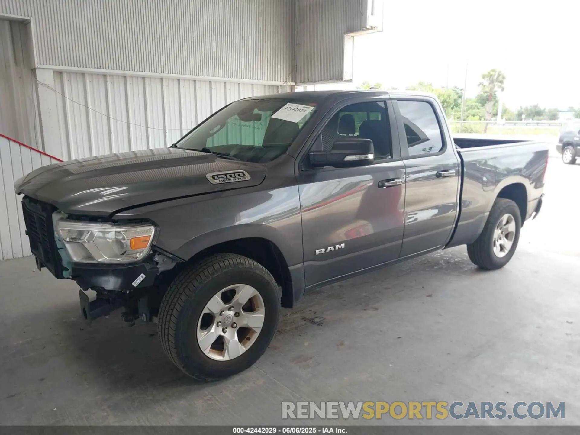 2 Photograph of a damaged car 1C6RREBT2MN747391 RAM 1500 2021