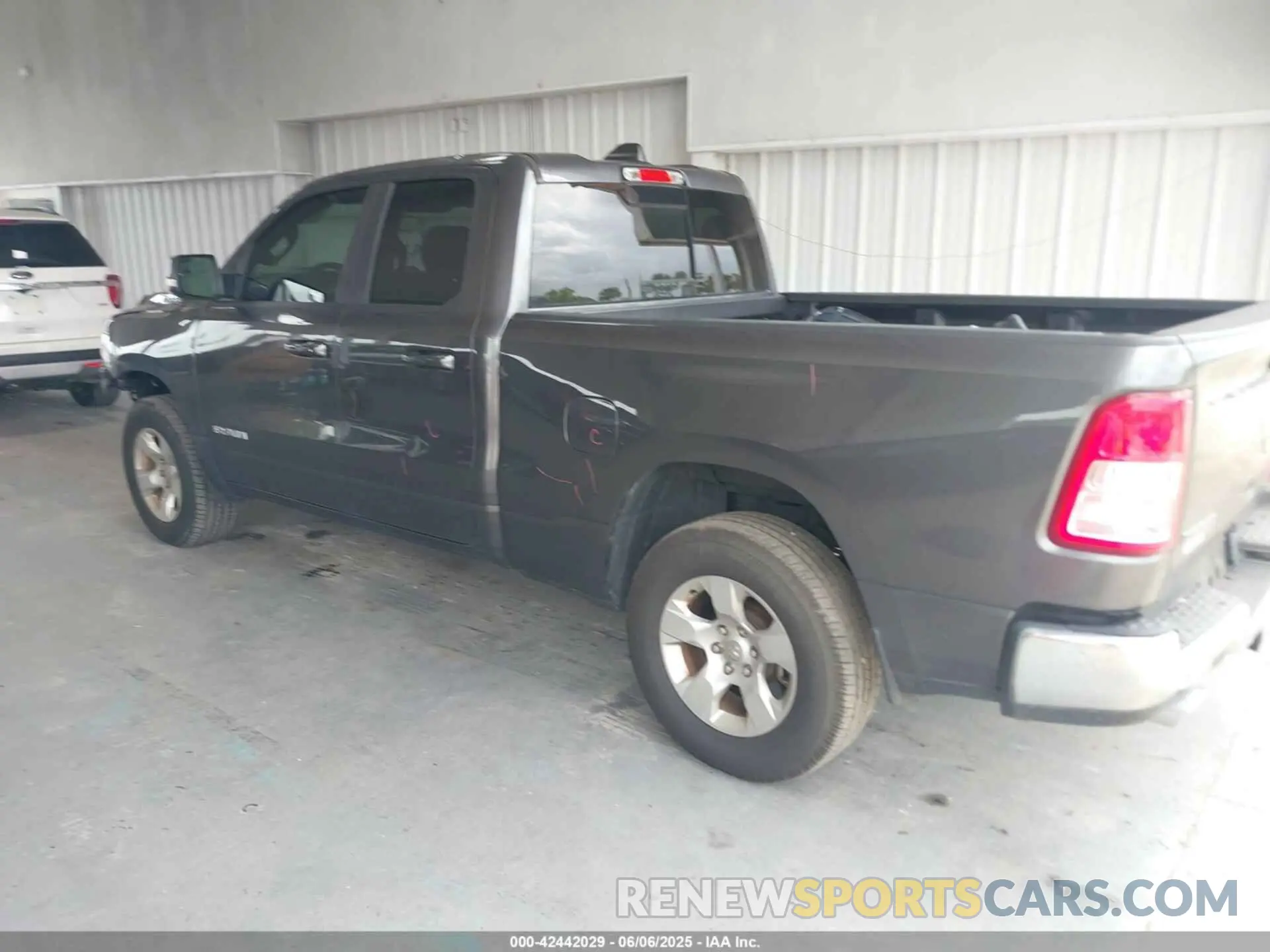 3 Photograph of a damaged car 1C6RREBT2MN747391 RAM 1500 2021