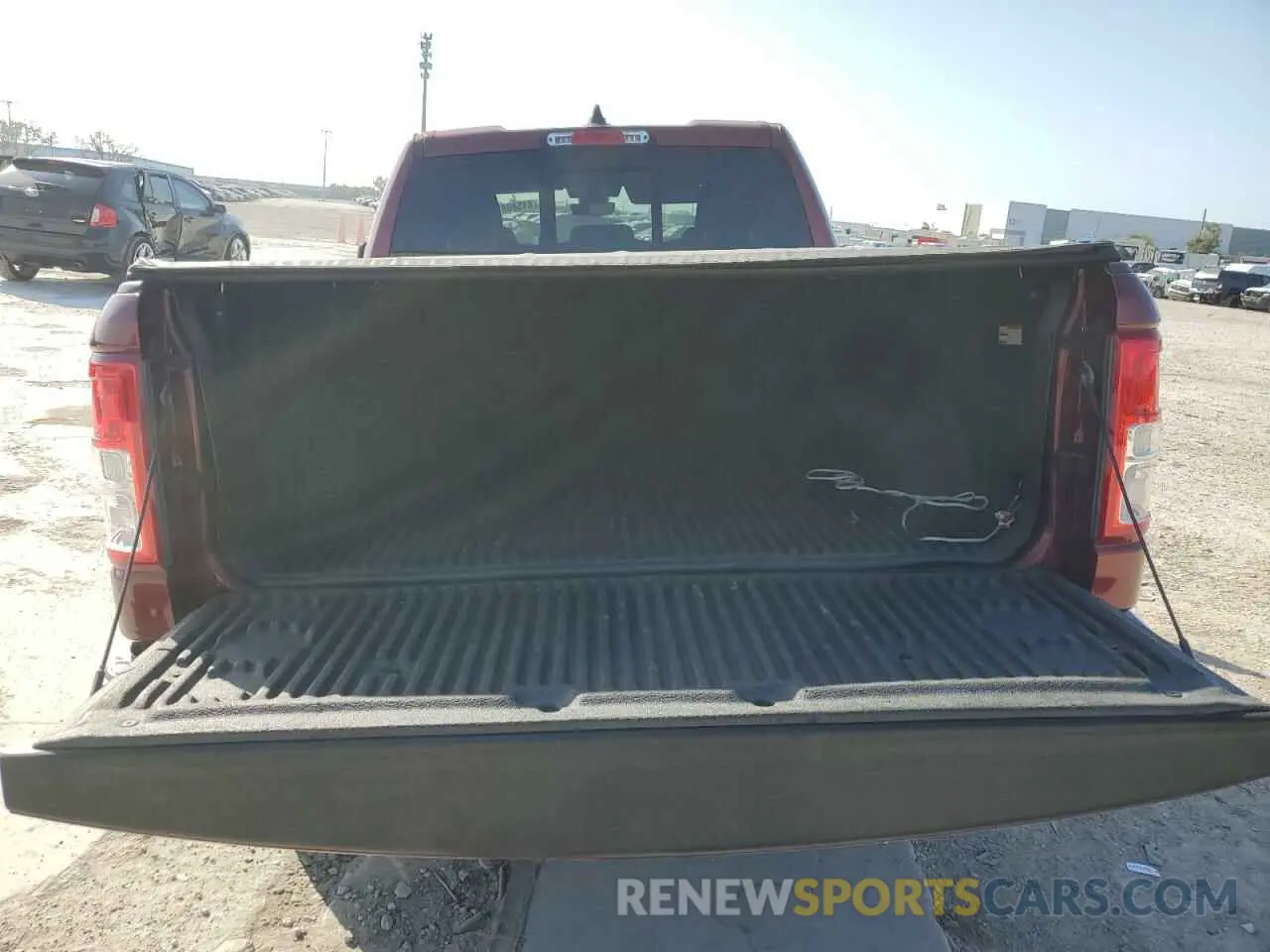 6 Photograph of a damaged car 1C6RREBT3MN565764 RAM 1500 2021