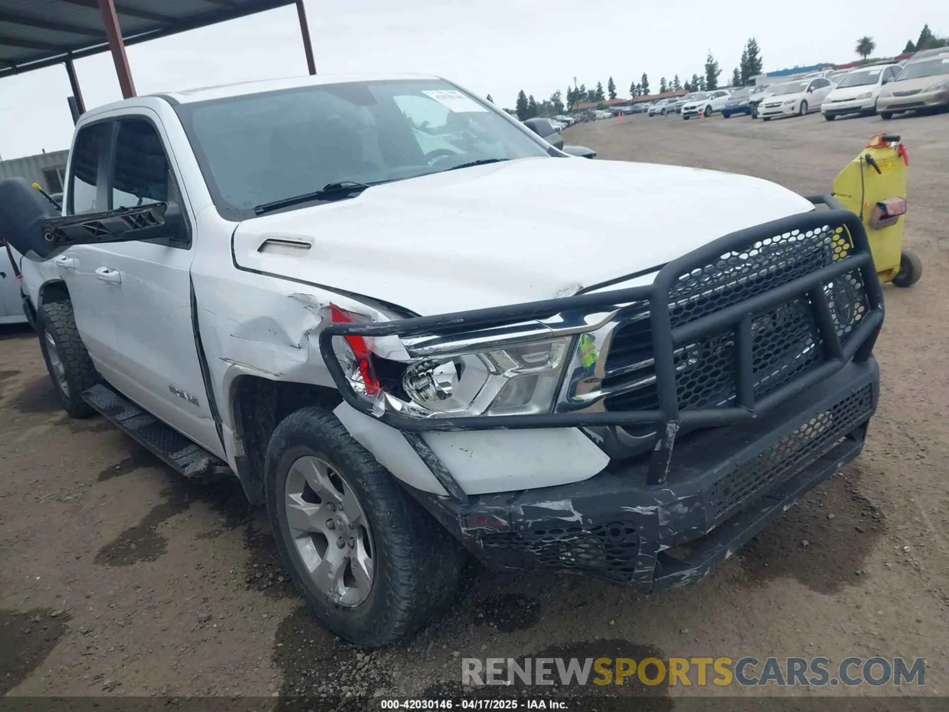 1 Photograph of a damaged car 1C6RREBT5MN609716 RAM 1500 2021