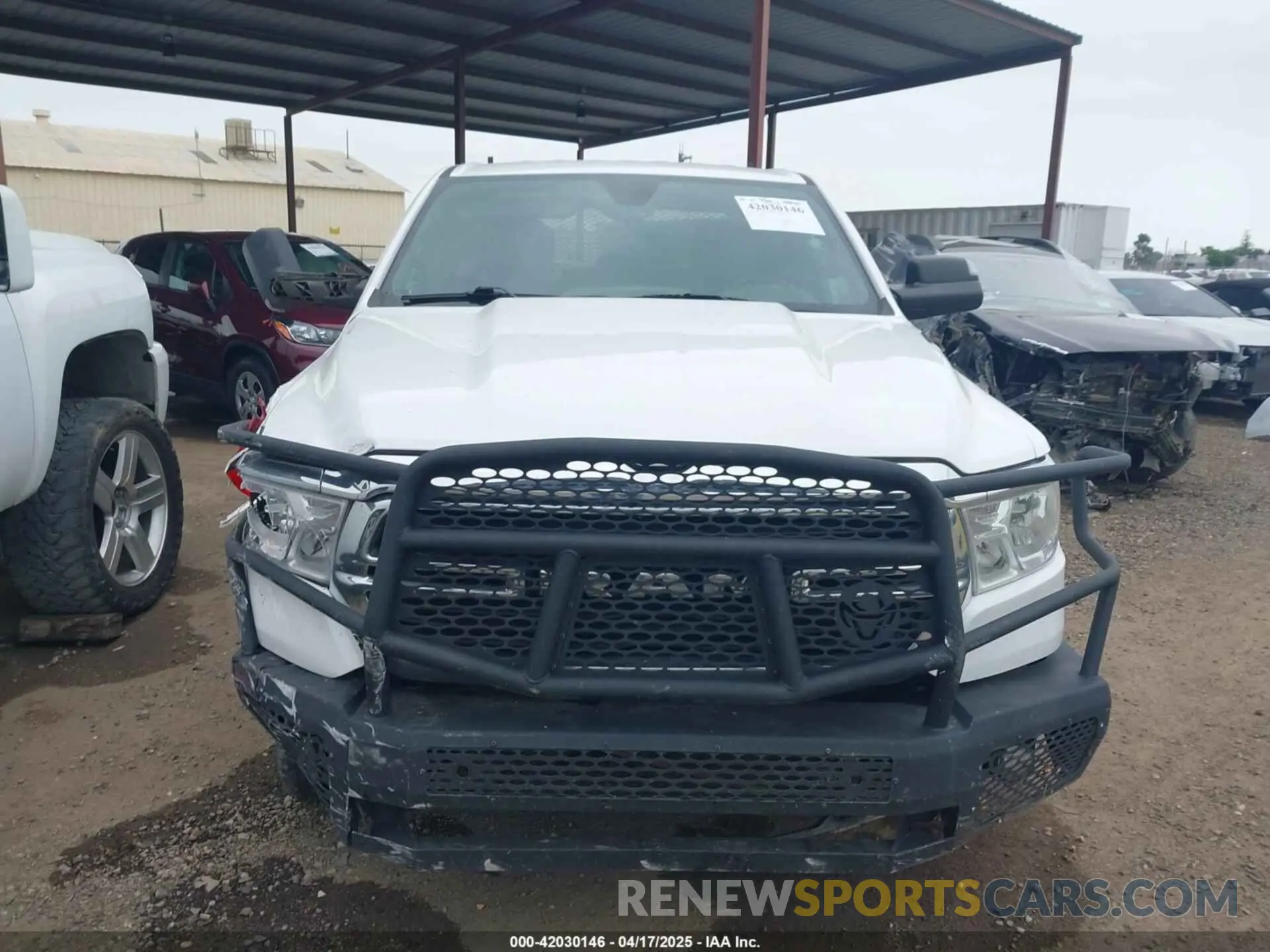 12 Photograph of a damaged car 1C6RREBT5MN609716 RAM 1500 2021
