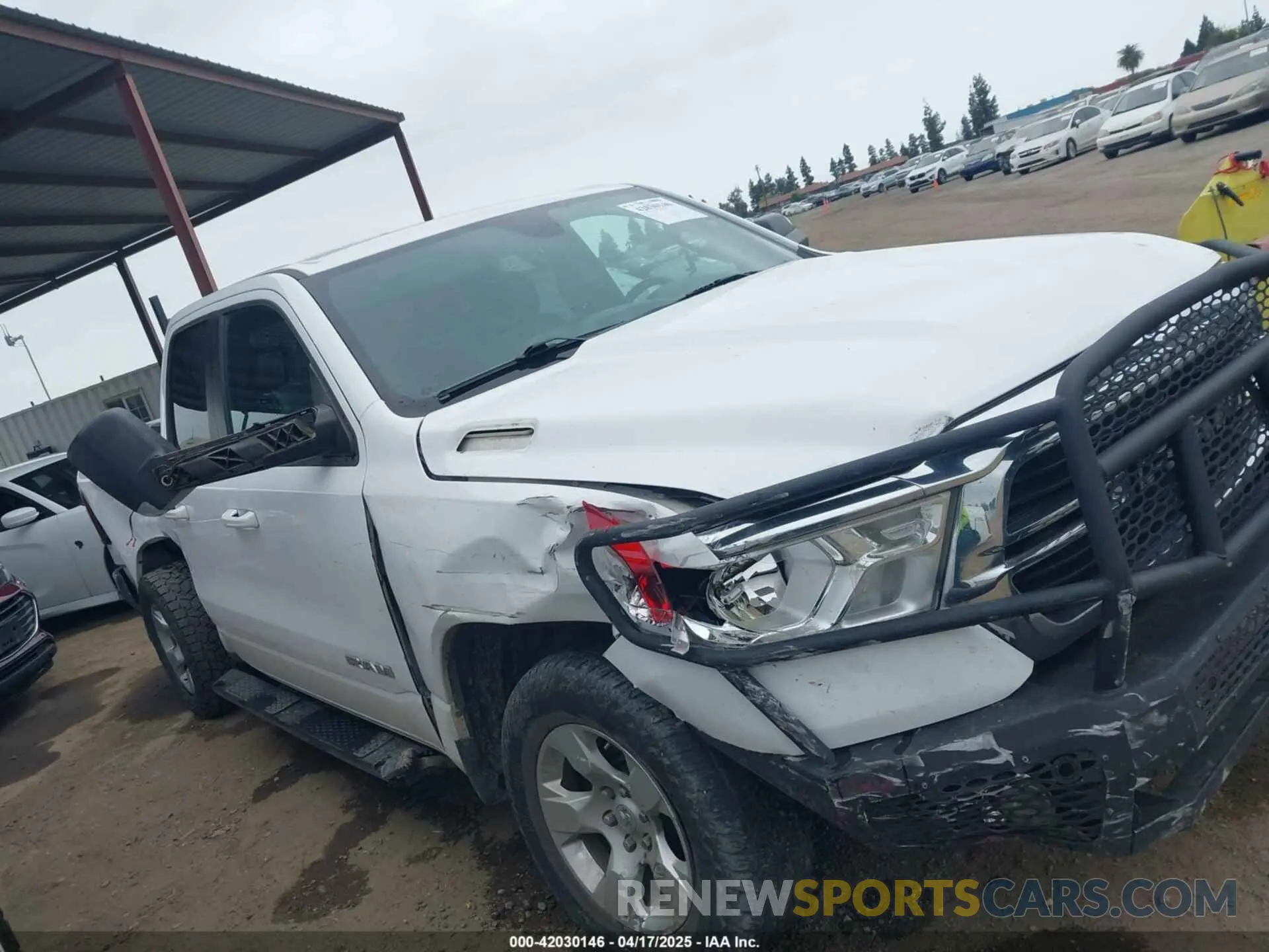 13 Photograph of a damaged car 1C6RREBT5MN609716 RAM 1500 2021