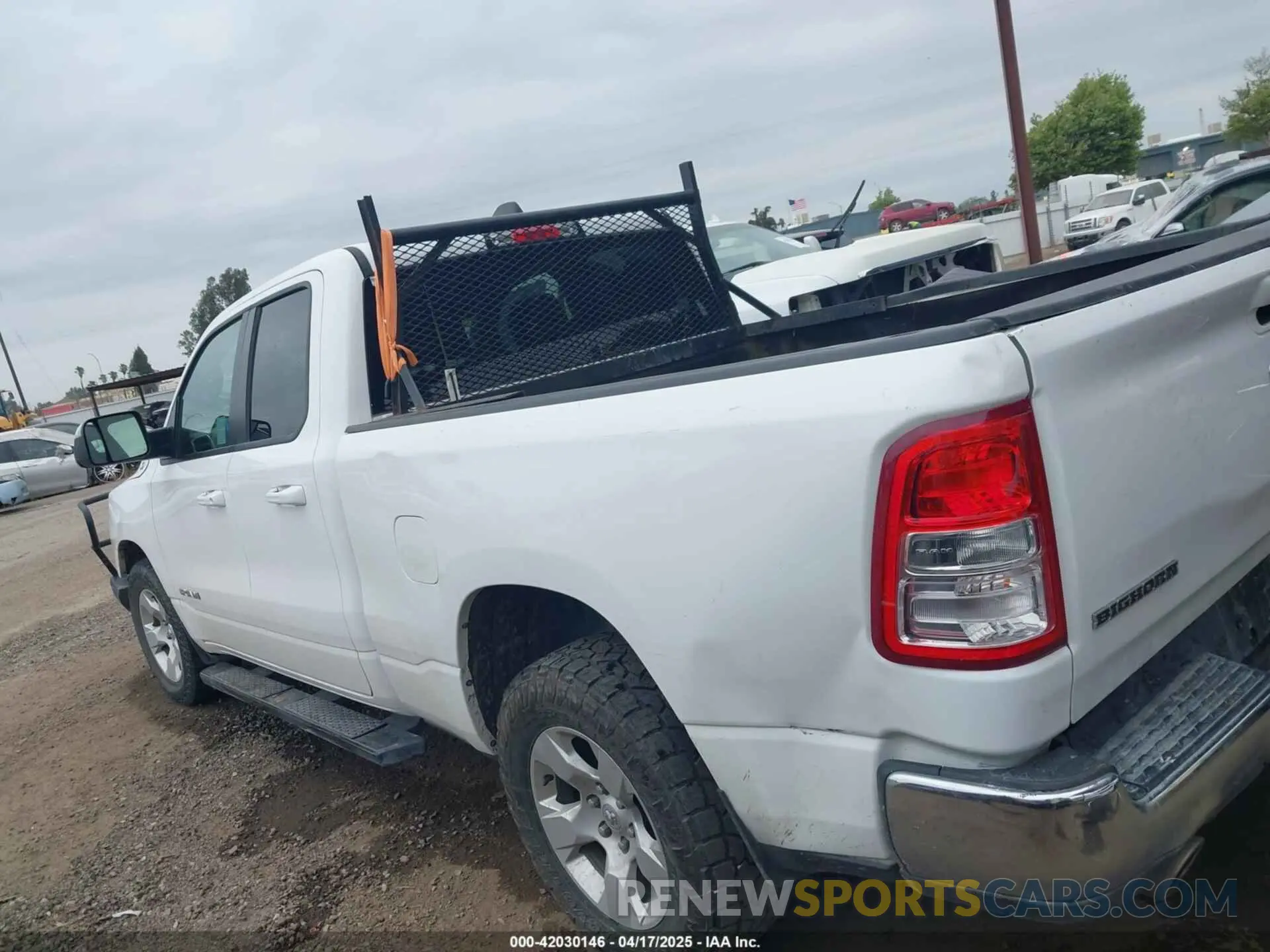 14 Photograph of a damaged car 1C6RREBT5MN609716 RAM 1500 2021