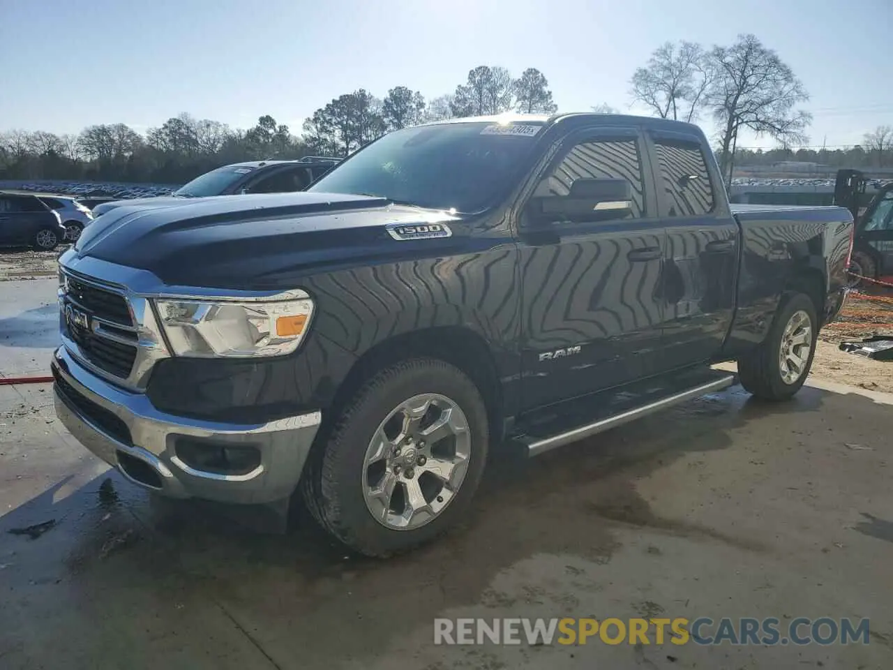 1 Photograph of a damaged car 1C6RREBT5MN819782 RAM 1500 2021