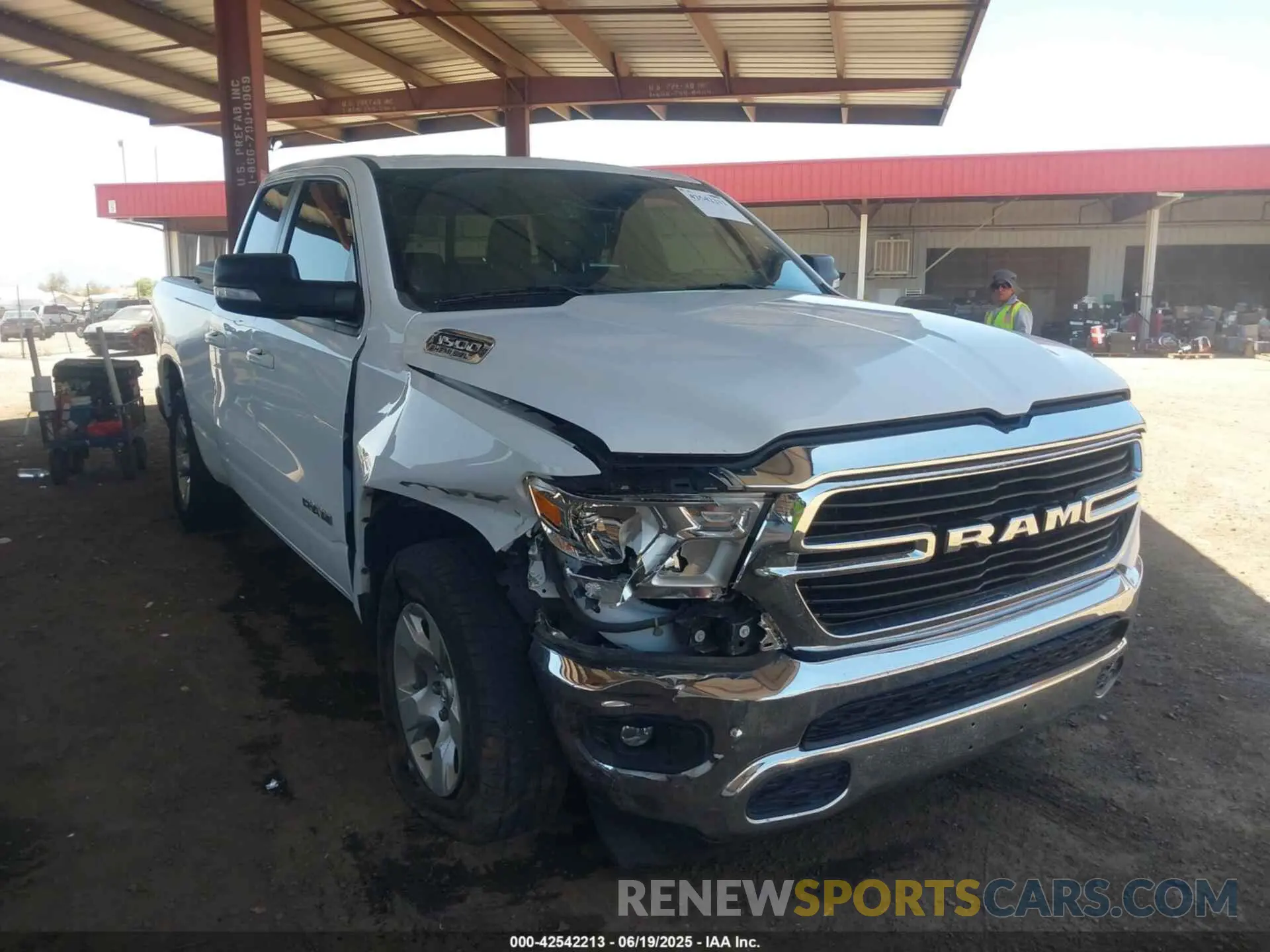 1 Photograph of a damaged car 1C6RREBT6MN530328 RAM 1500 2021
