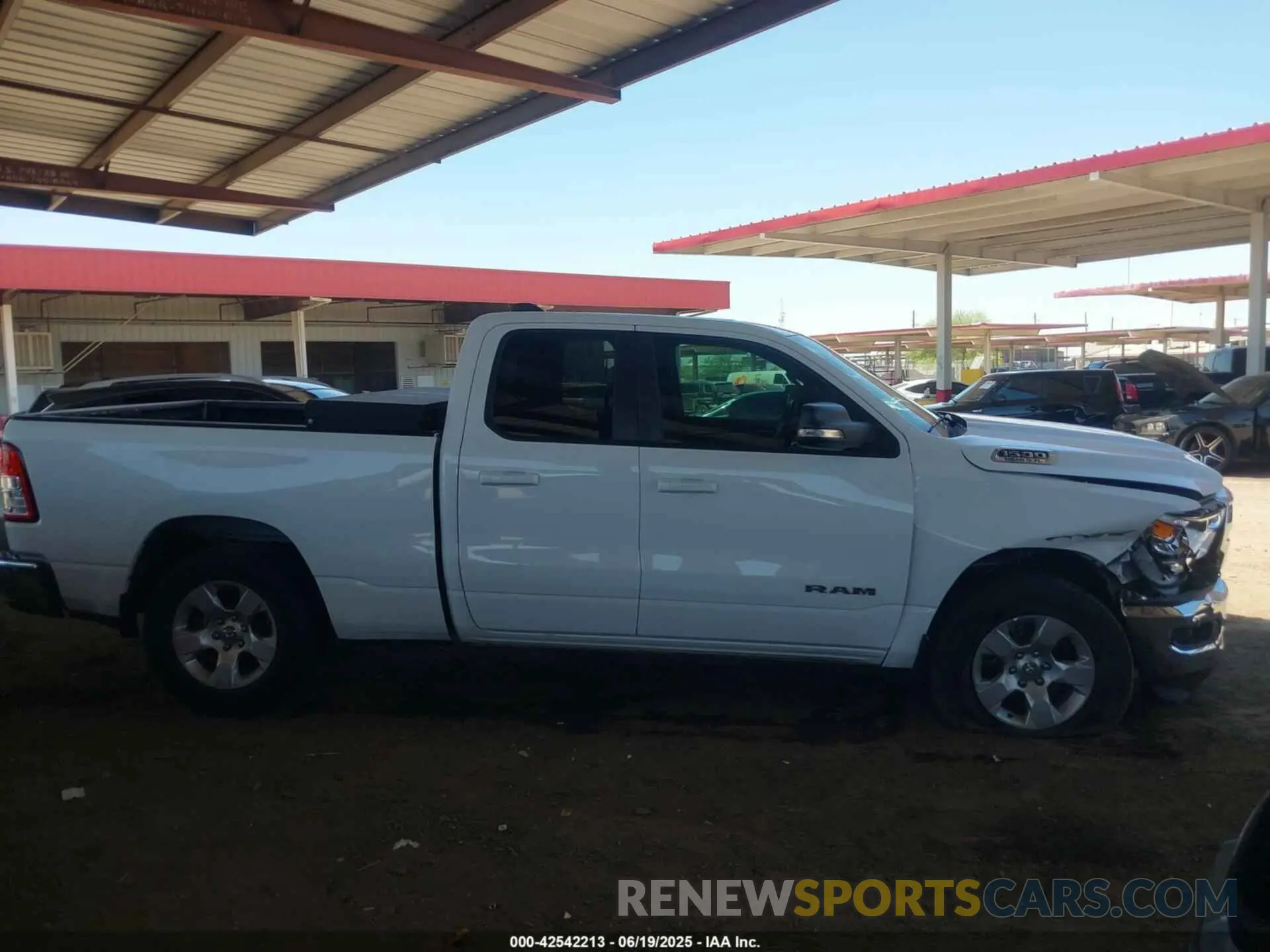 13 Photograph of a damaged car 1C6RREBT6MN530328 RAM 1500 2021