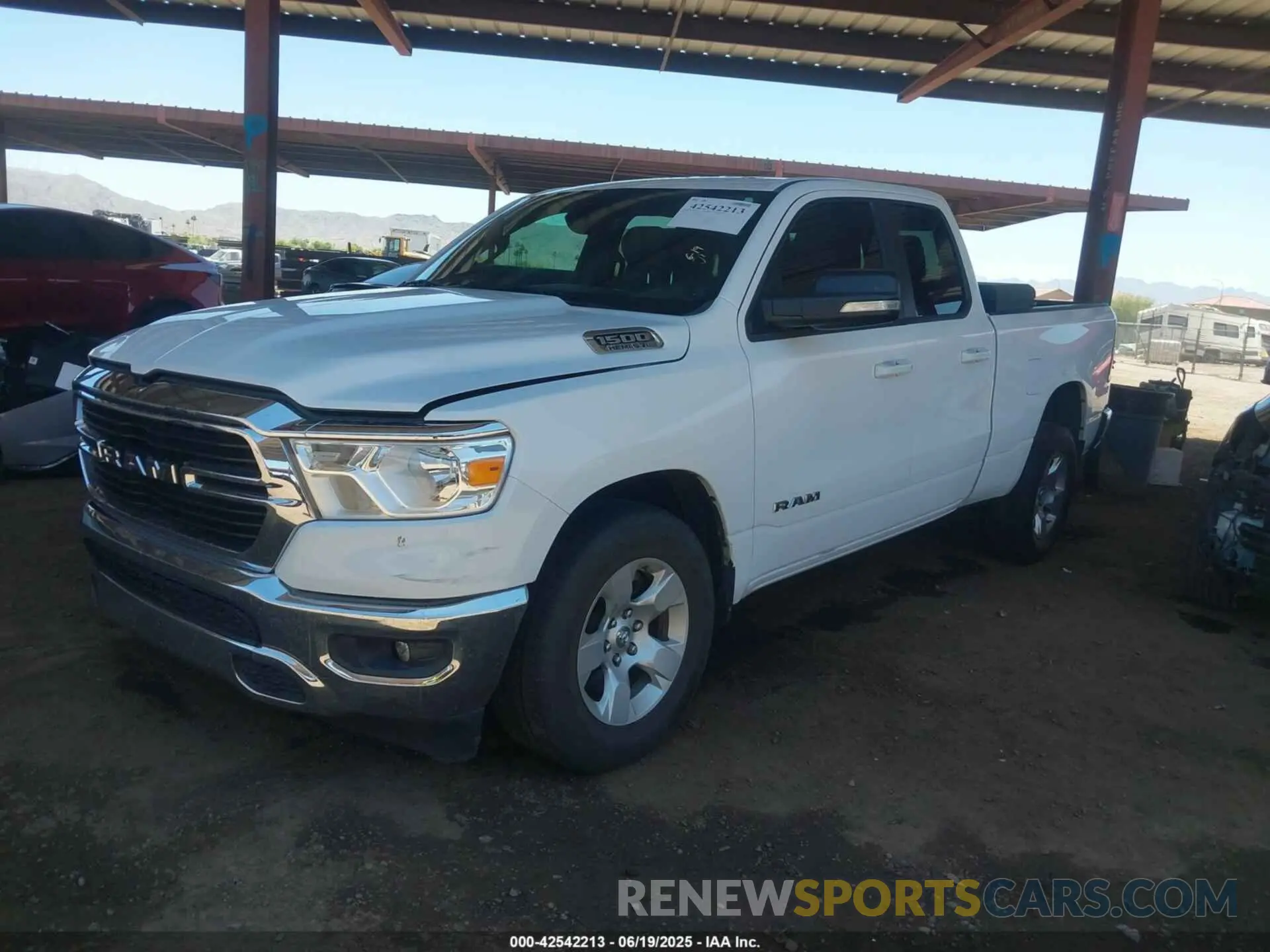 2 Photograph of a damaged car 1C6RREBT6MN530328 RAM 1500 2021