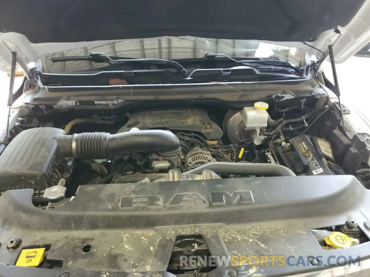 11 Photograph of a damaged car 1C6RREBT8MN625392 RAM 1500 2021