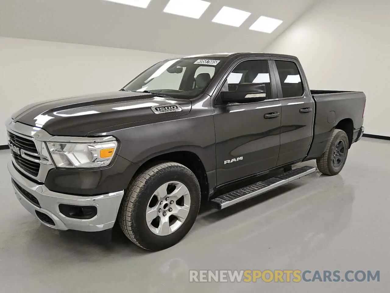 1 Photograph of a damaged car 1C6RREBT9MN709284 RAM 1500 2021