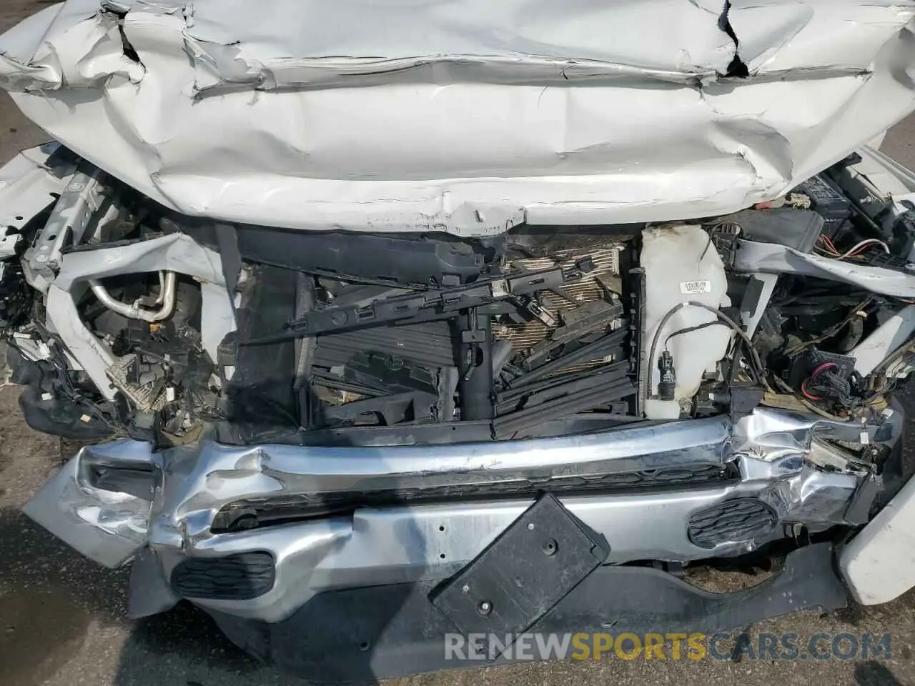 11 Photograph of a damaged car 1C6RREDT1MN815922 RAM 1500 2021