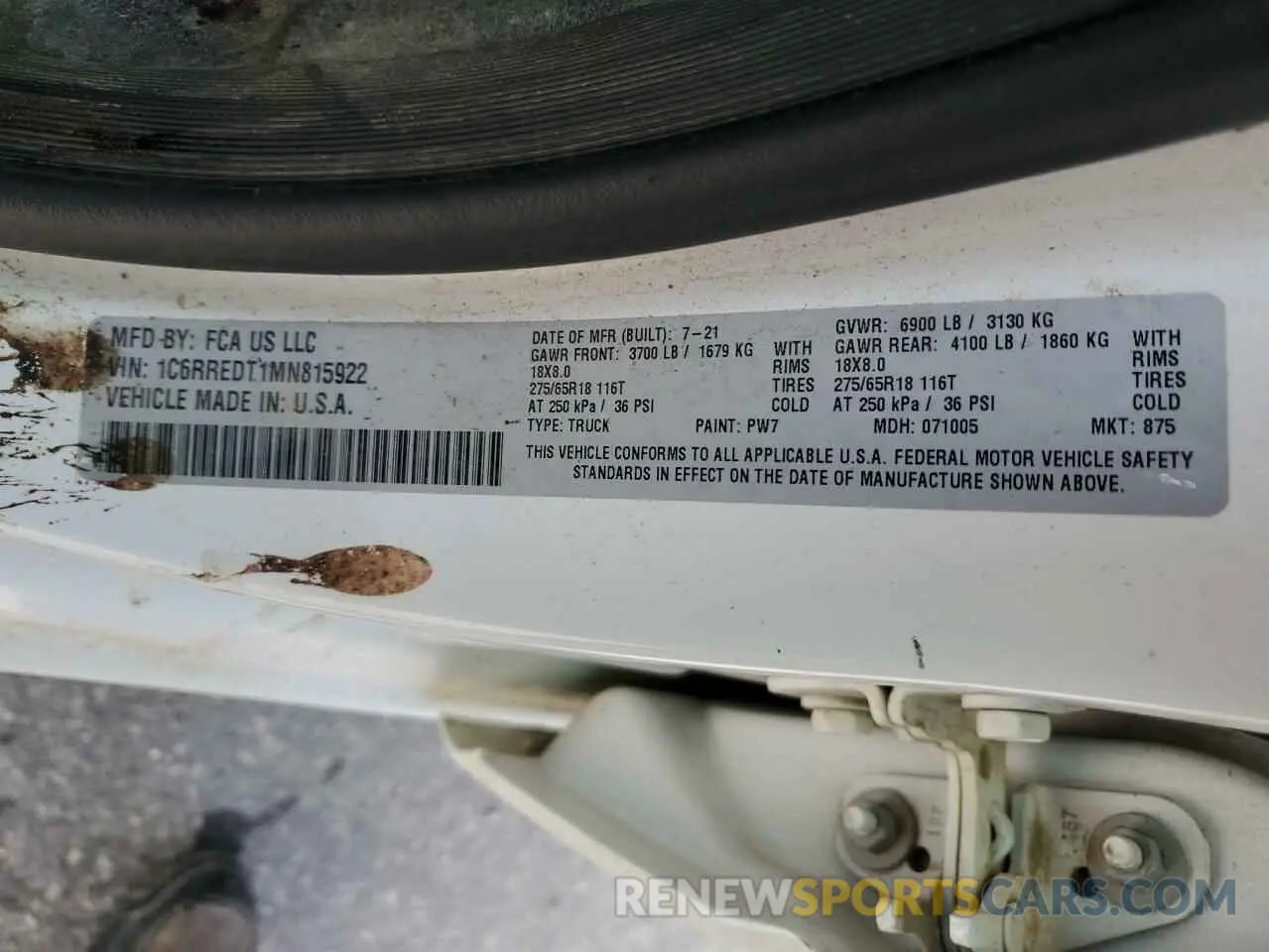 12 Photograph of a damaged car 1C6RREDT1MN815922 RAM 1500 2021
