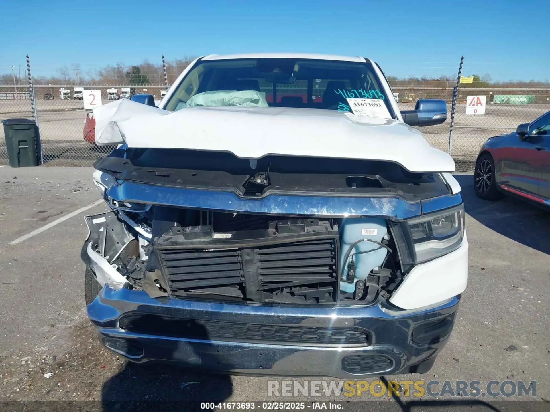 12 Photograph of a damaged car 1C6RREDT8MN708298 RAM 1500 2021