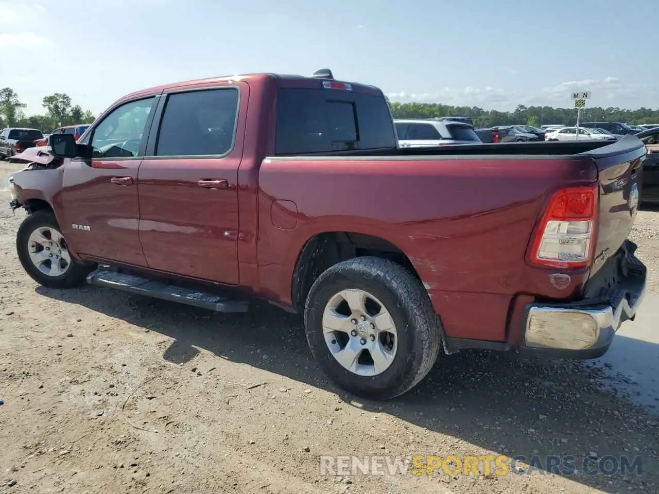 2 Photograph of a damaged car 1C6RREFG1MN593219 RAM 1500 2021