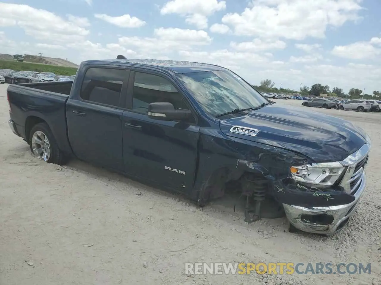 4 Photograph of a damaged car 1C6RREFG5MN801831 RAM 1500 2021