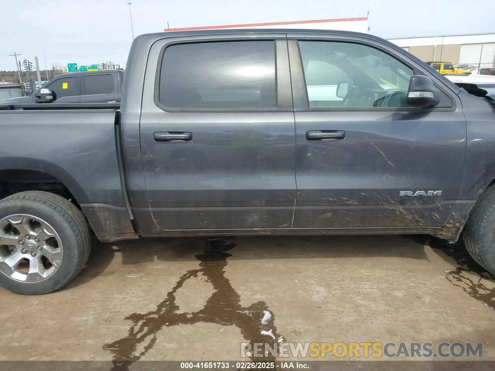 13 Photograph of a damaged car 1C6RREFG5MN802090 RAM 1500 2021