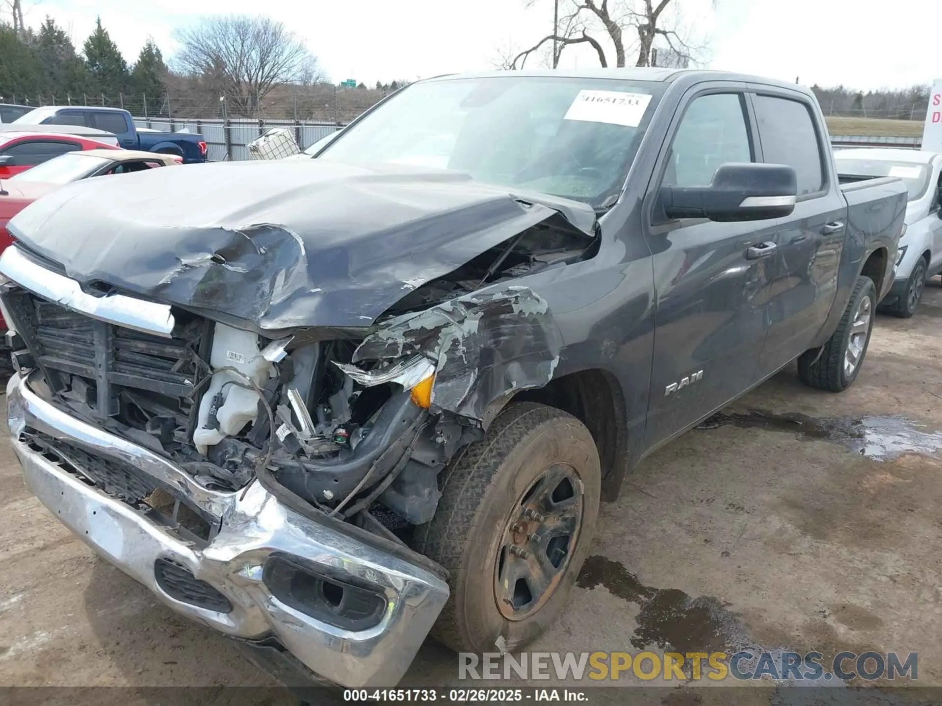 2 Photograph of a damaged car 1C6RREFG5MN802090 RAM 1500 2021