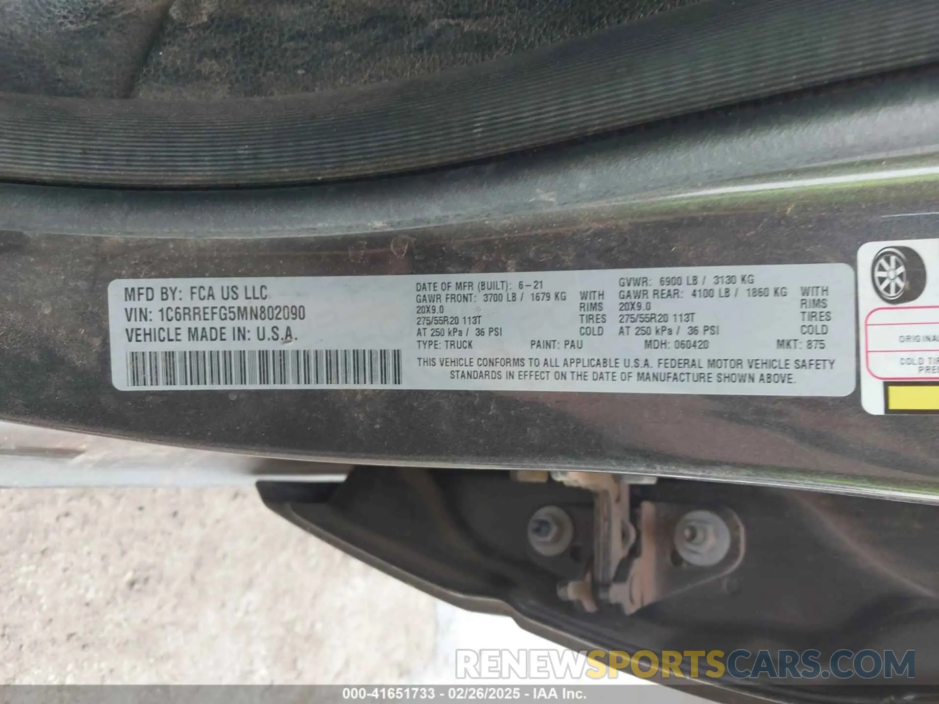 9 Photograph of a damaged car 1C6RREFG5MN802090 RAM 1500 2021