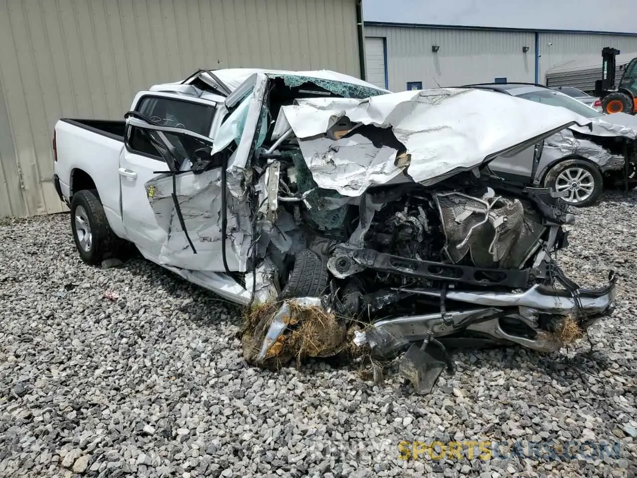4 Photograph of a damaged car 1C6RREFG6MN608488 RAM 1500 2021